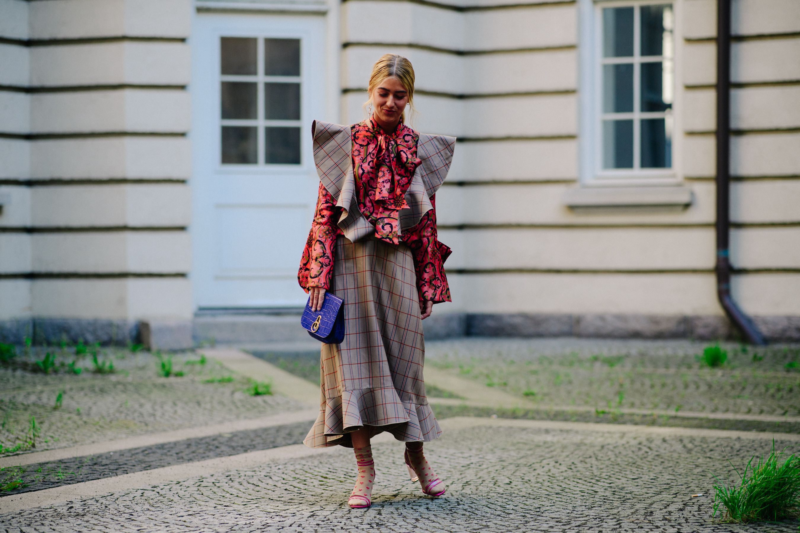 Blogger wearing apron dress with blouse