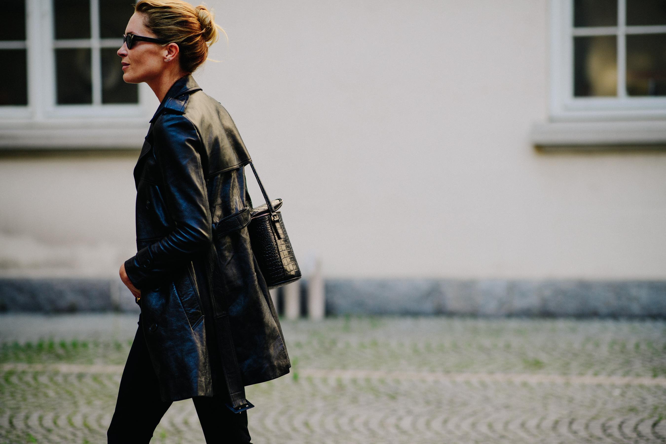 Woman wearing black leather coat