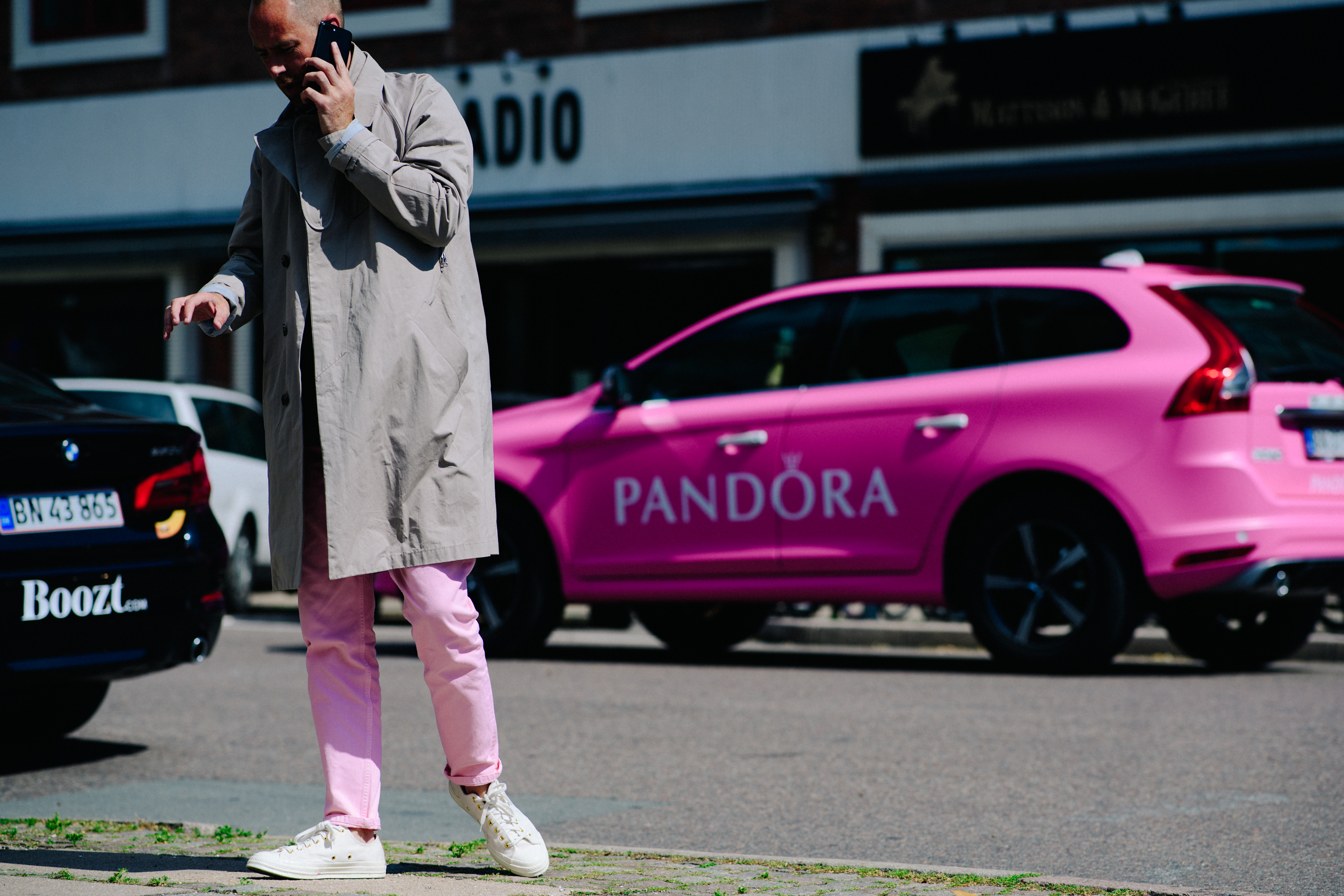 Editor wearing pink trousers