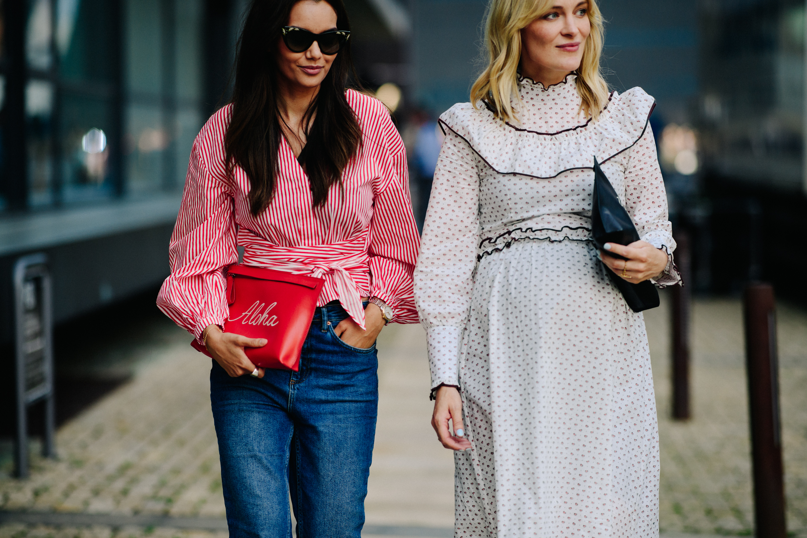 Two women wearing dress and shirt