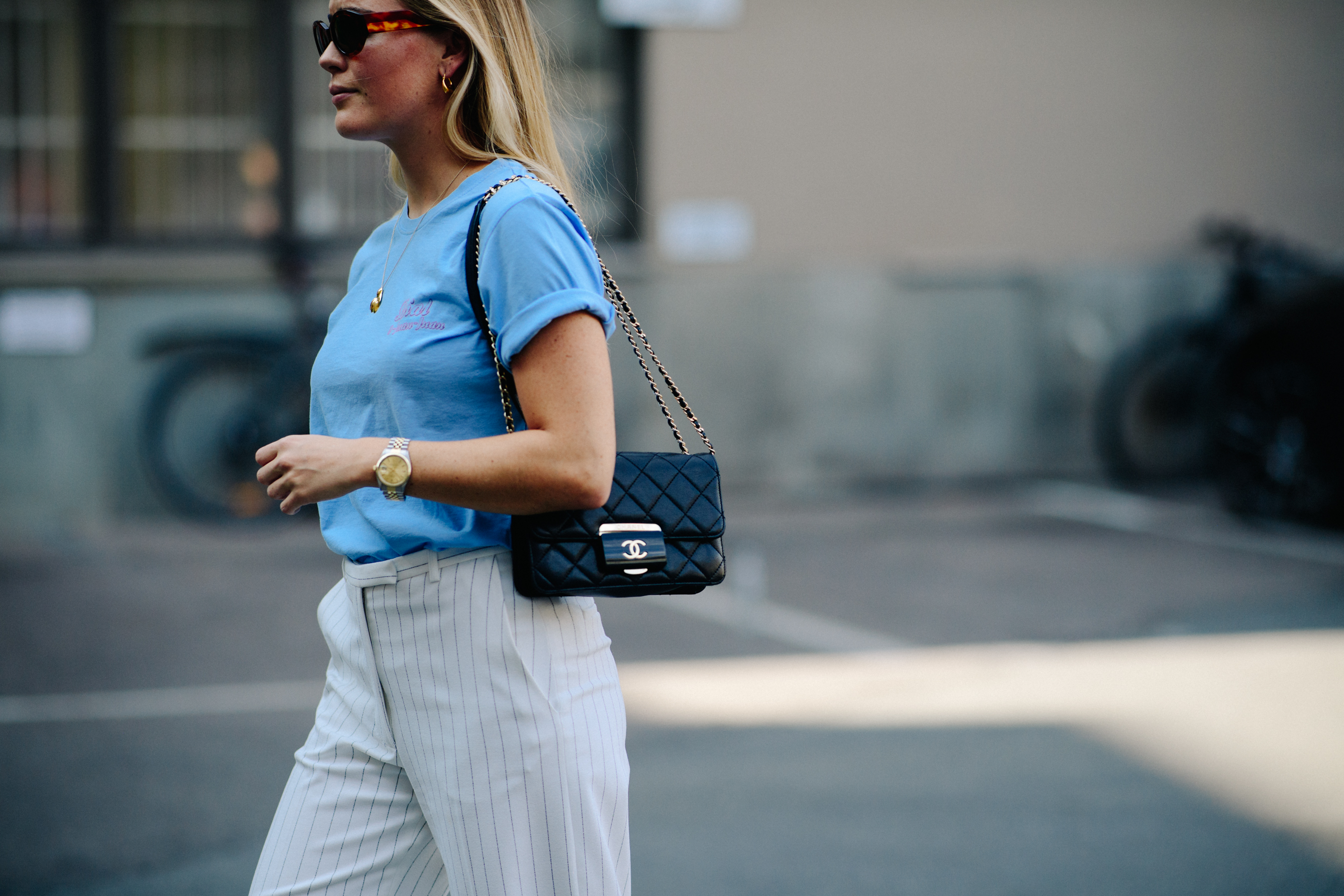 Woman wearing Chanel bag