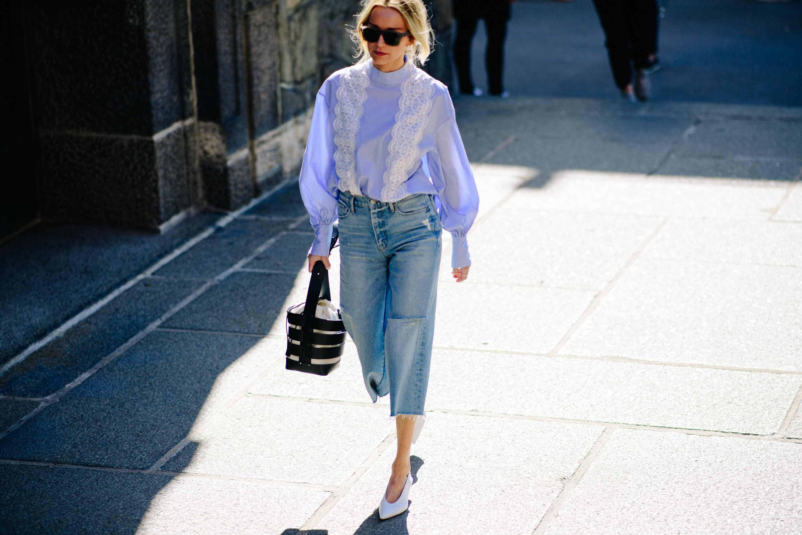 Woman wearing shirt and denim