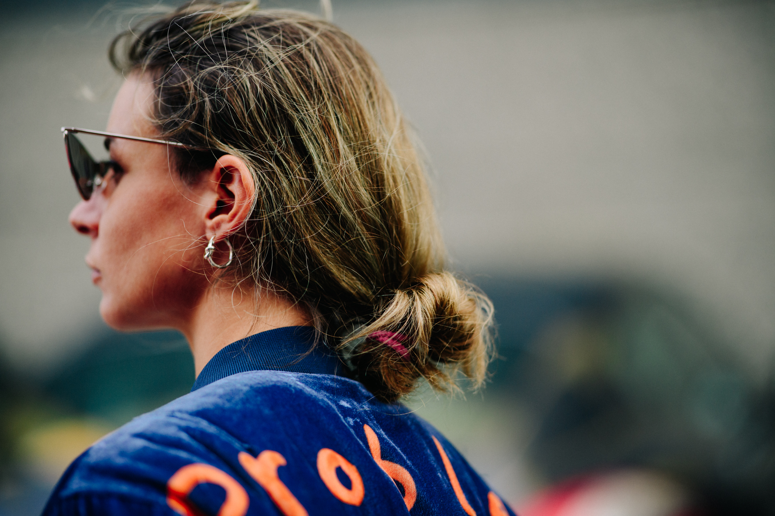 Blogger wearing glasses and earring