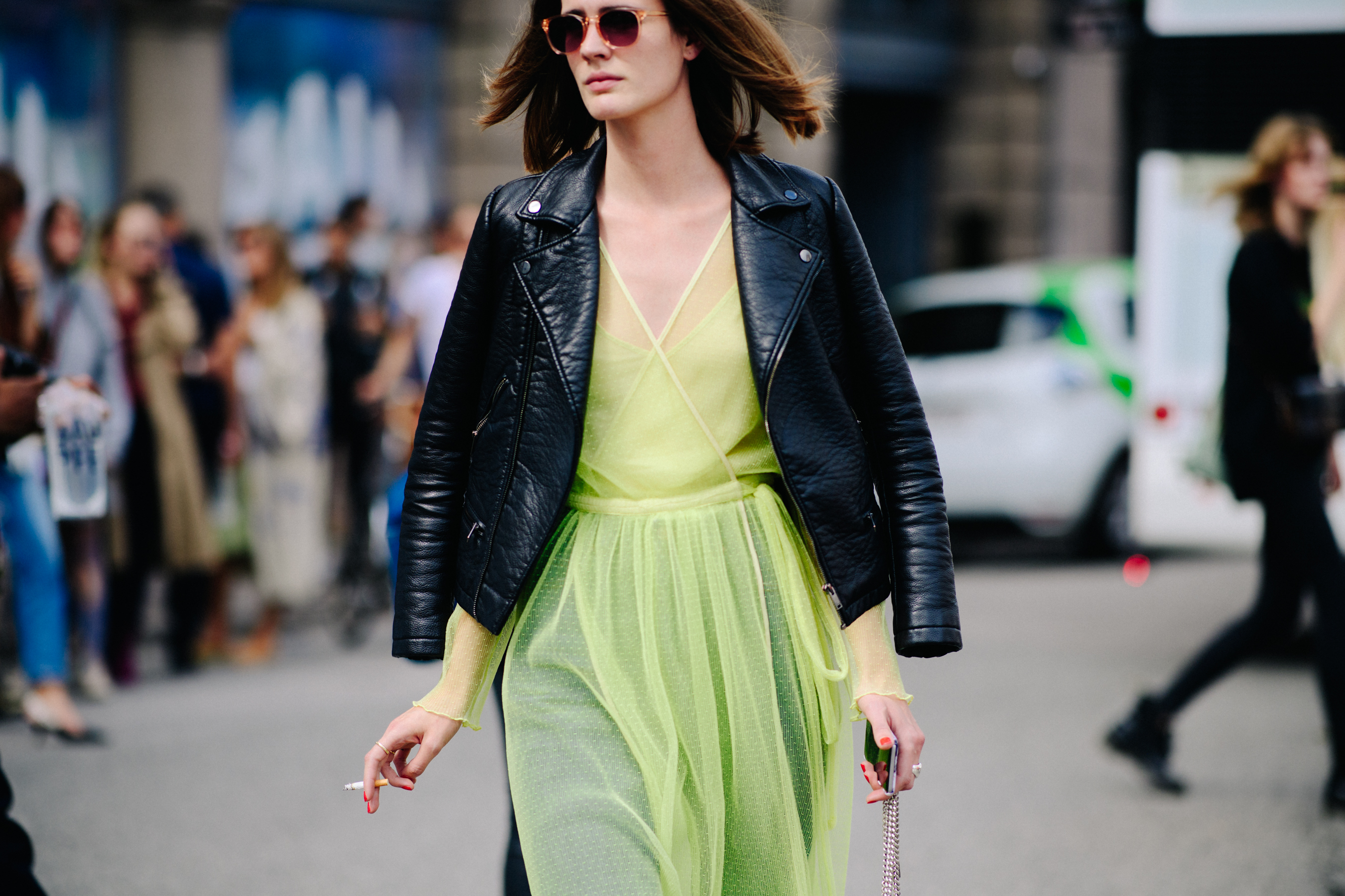 Woman wearing yellow dress and jacket