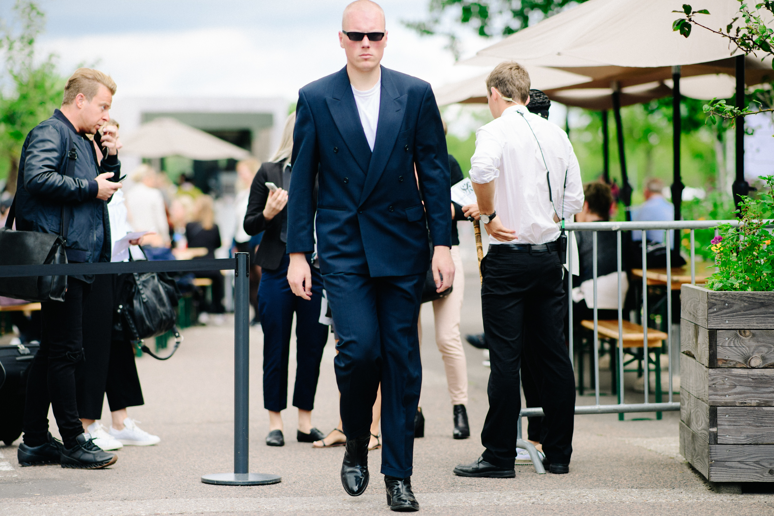 Bald man in glasses wearing suit