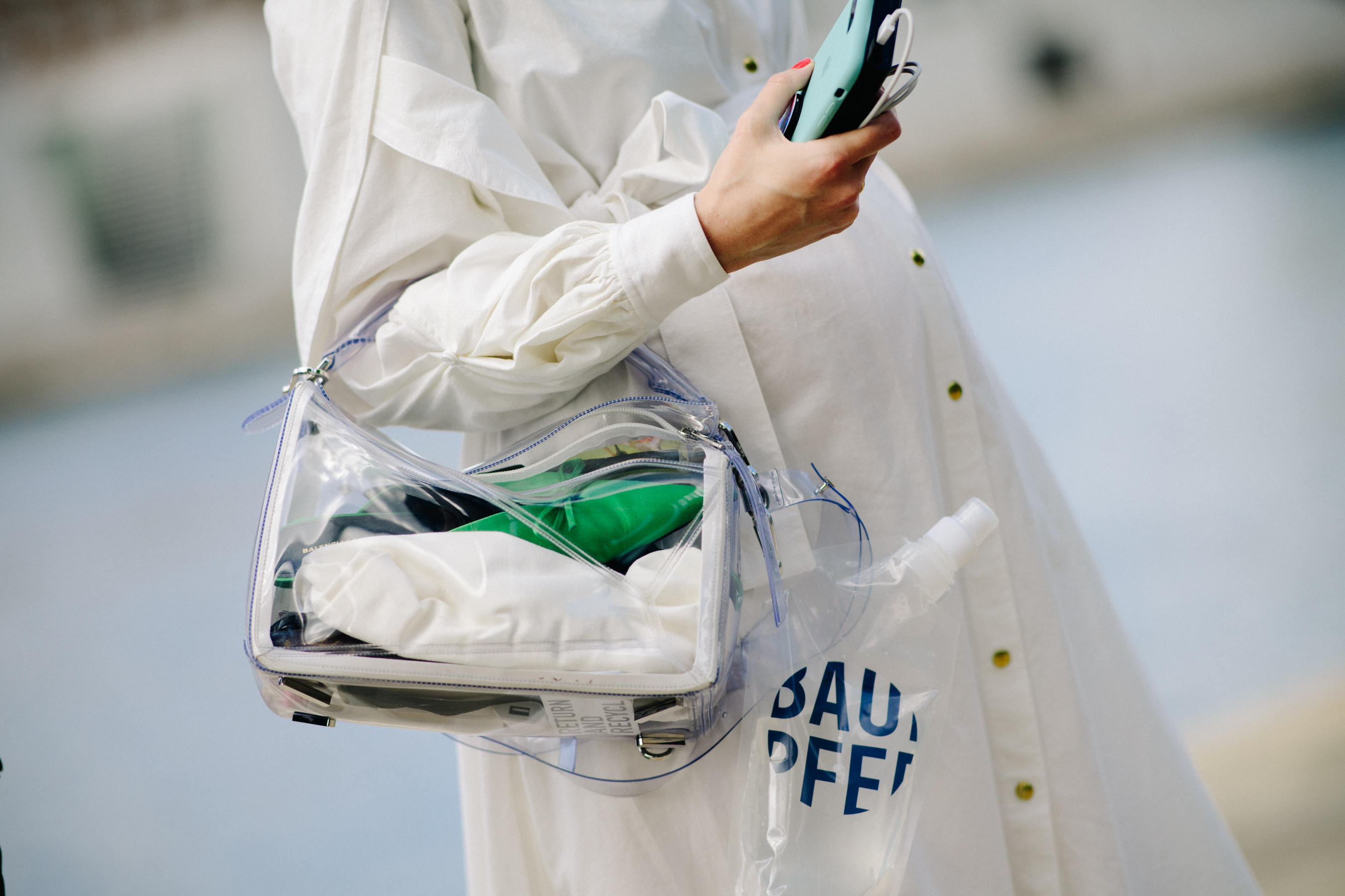 Woman wearing white shirt dress