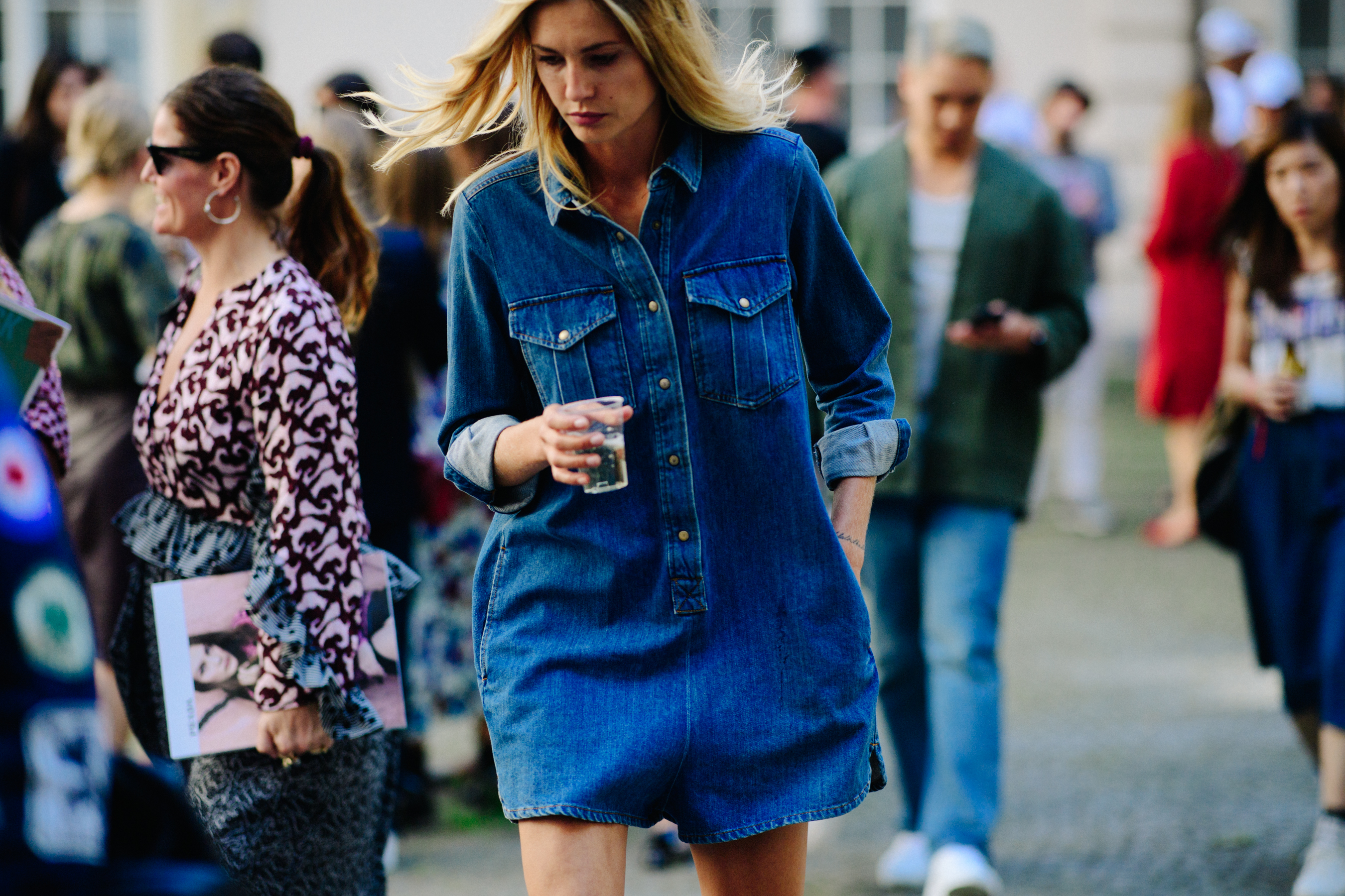 Woman wearing denim shirt dress