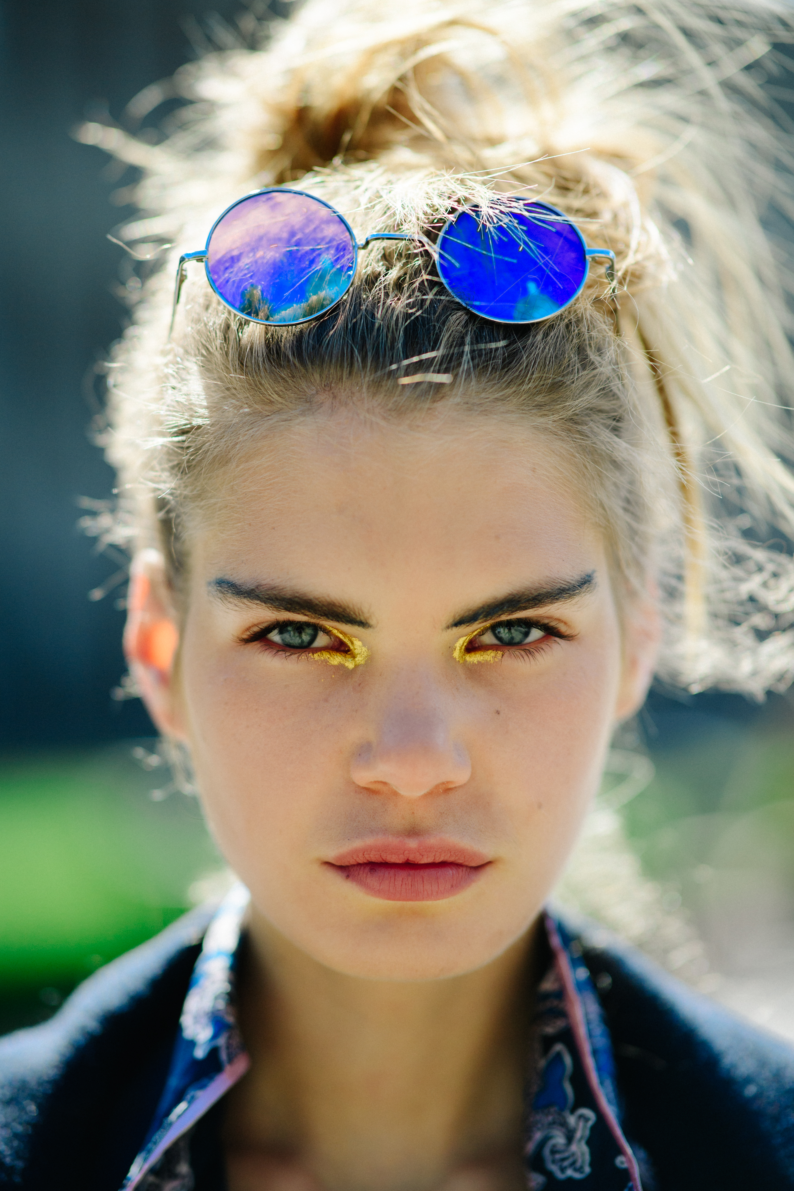 Model with blue glasses