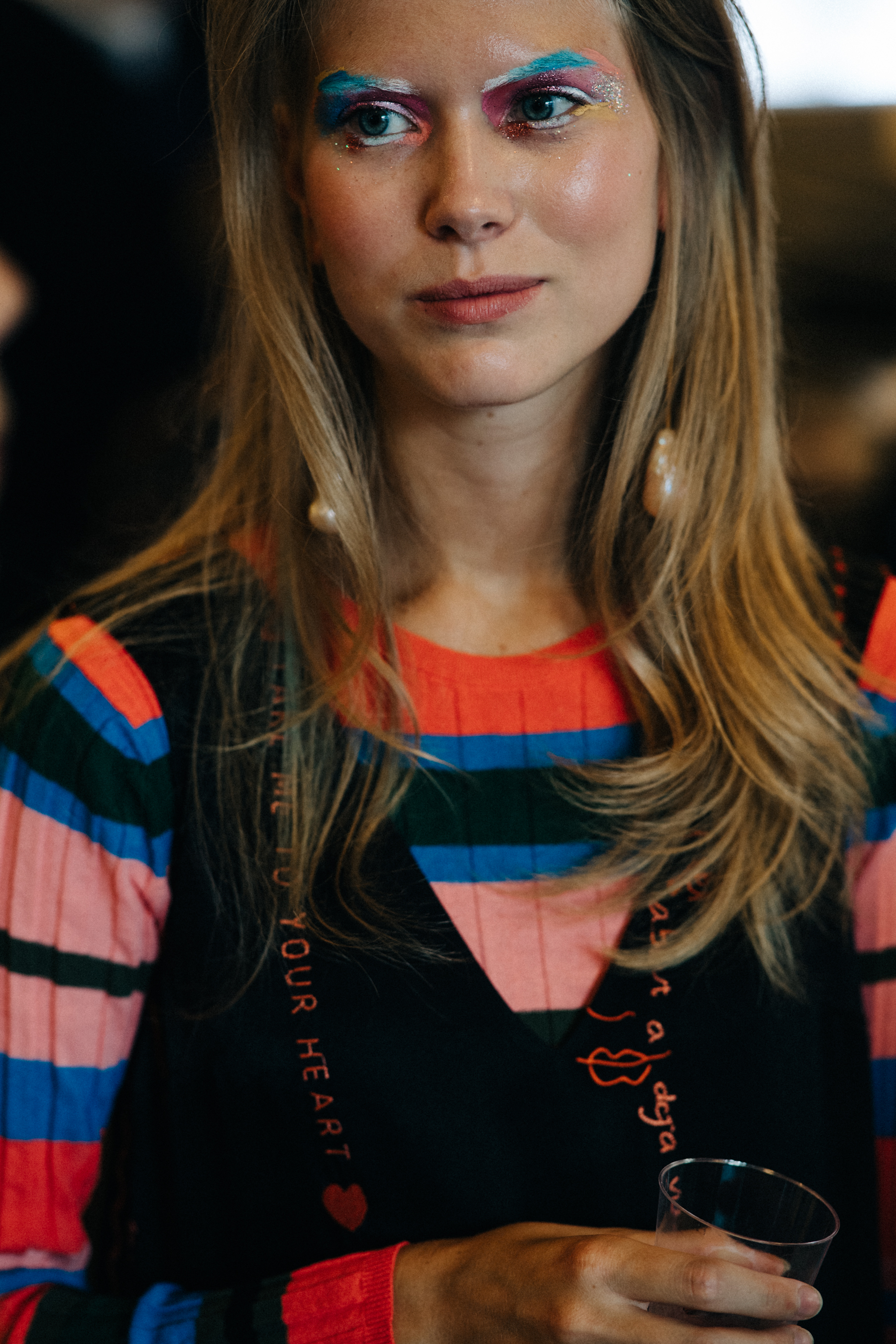 Model with blonde hair and make up