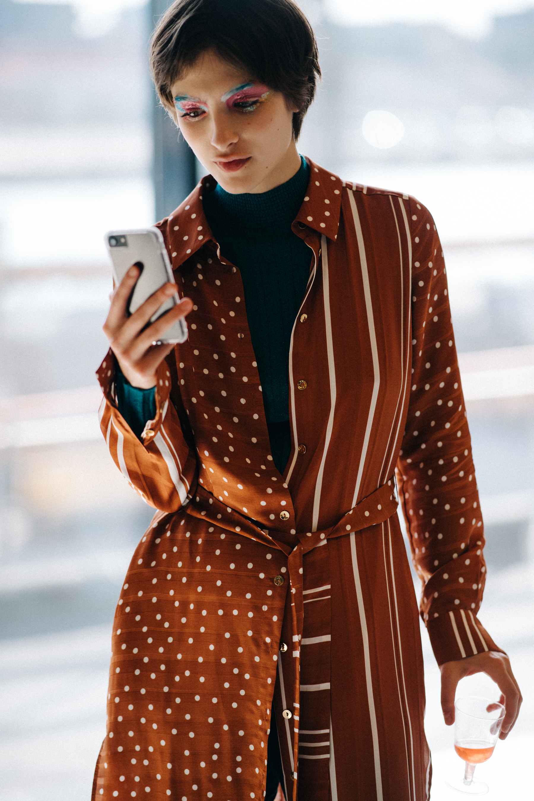 Model wearing robe and trousers