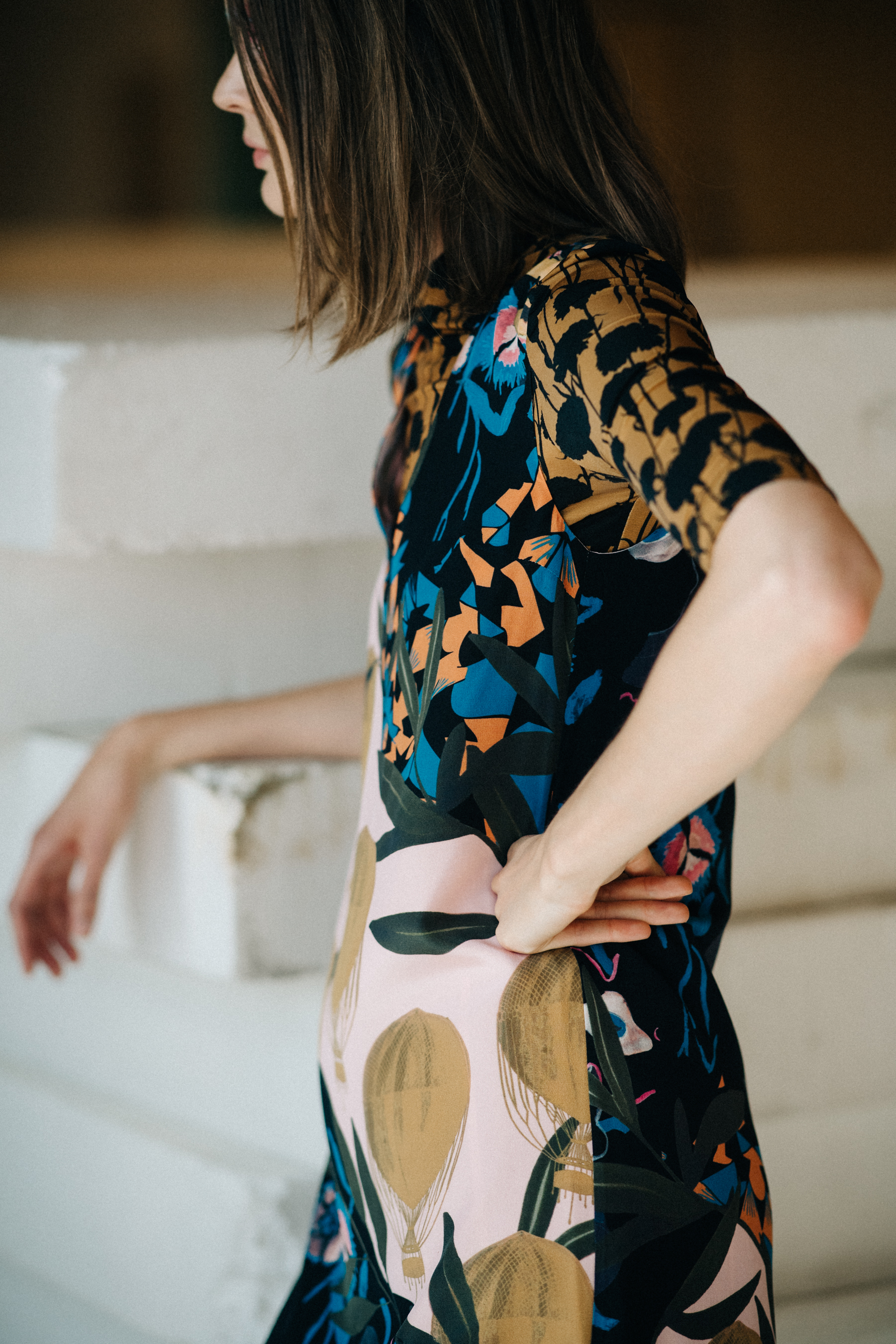 Model wearing printed dress