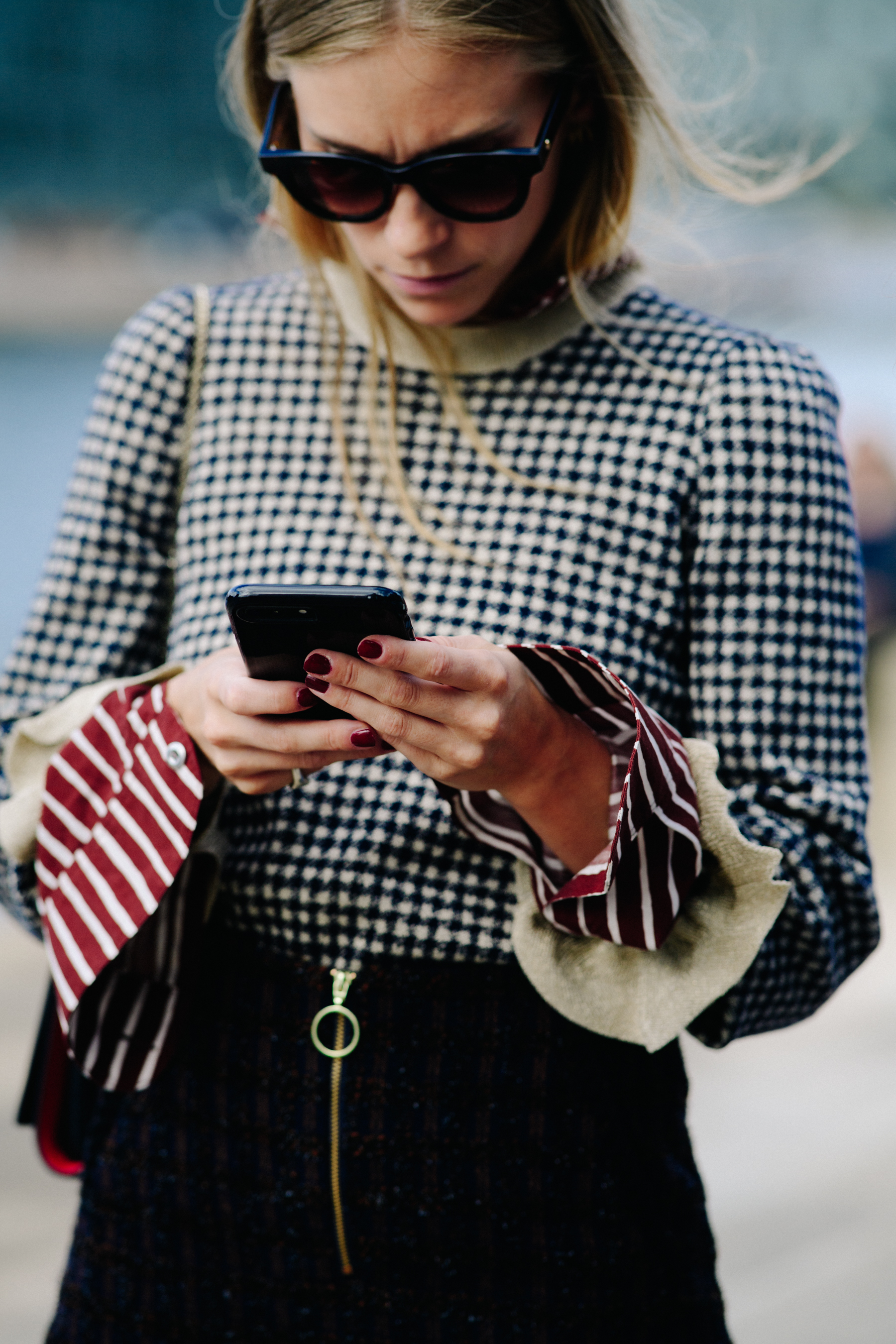 Norwegian influencer wearing sweater and shirt