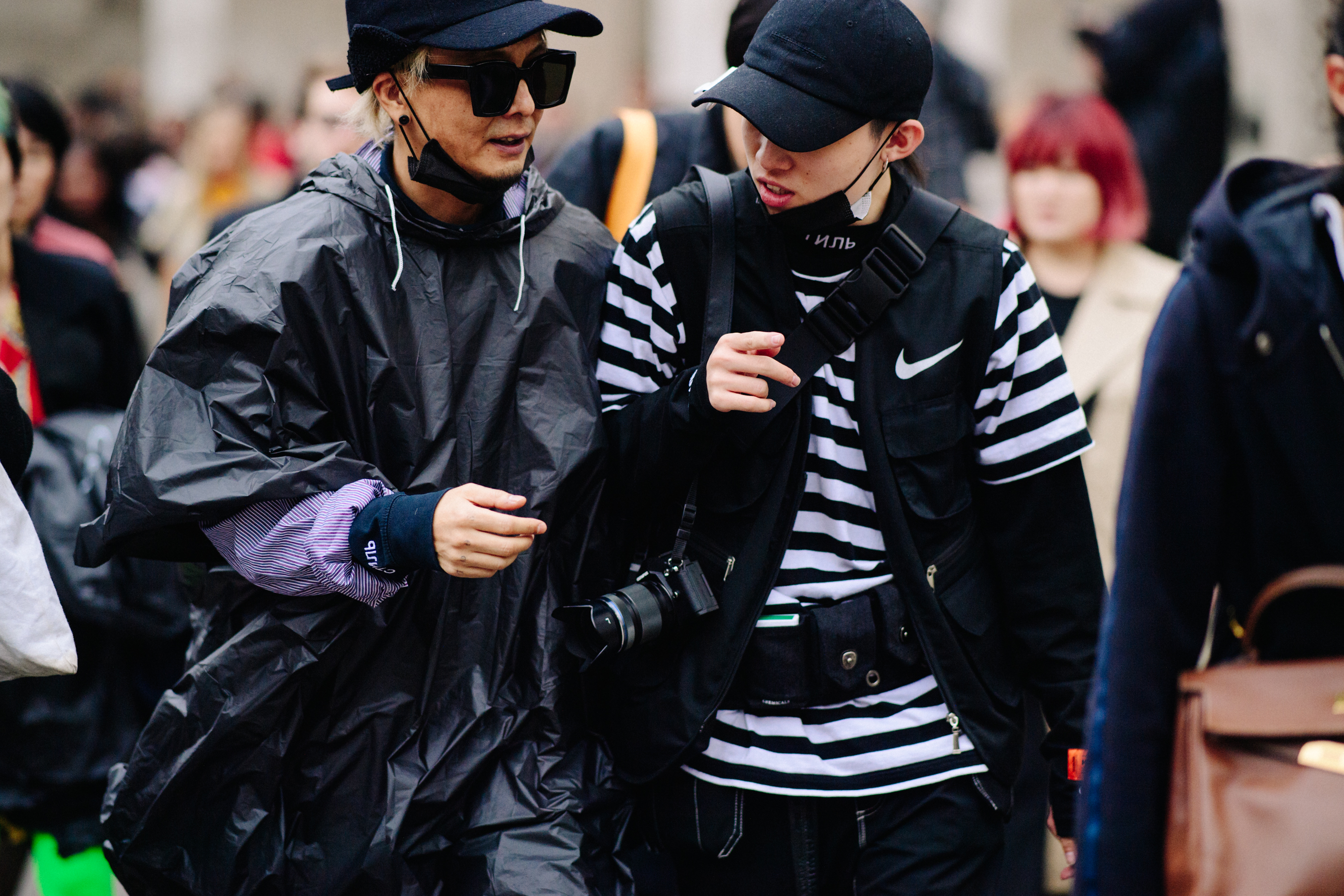 Two women wearing black clothes