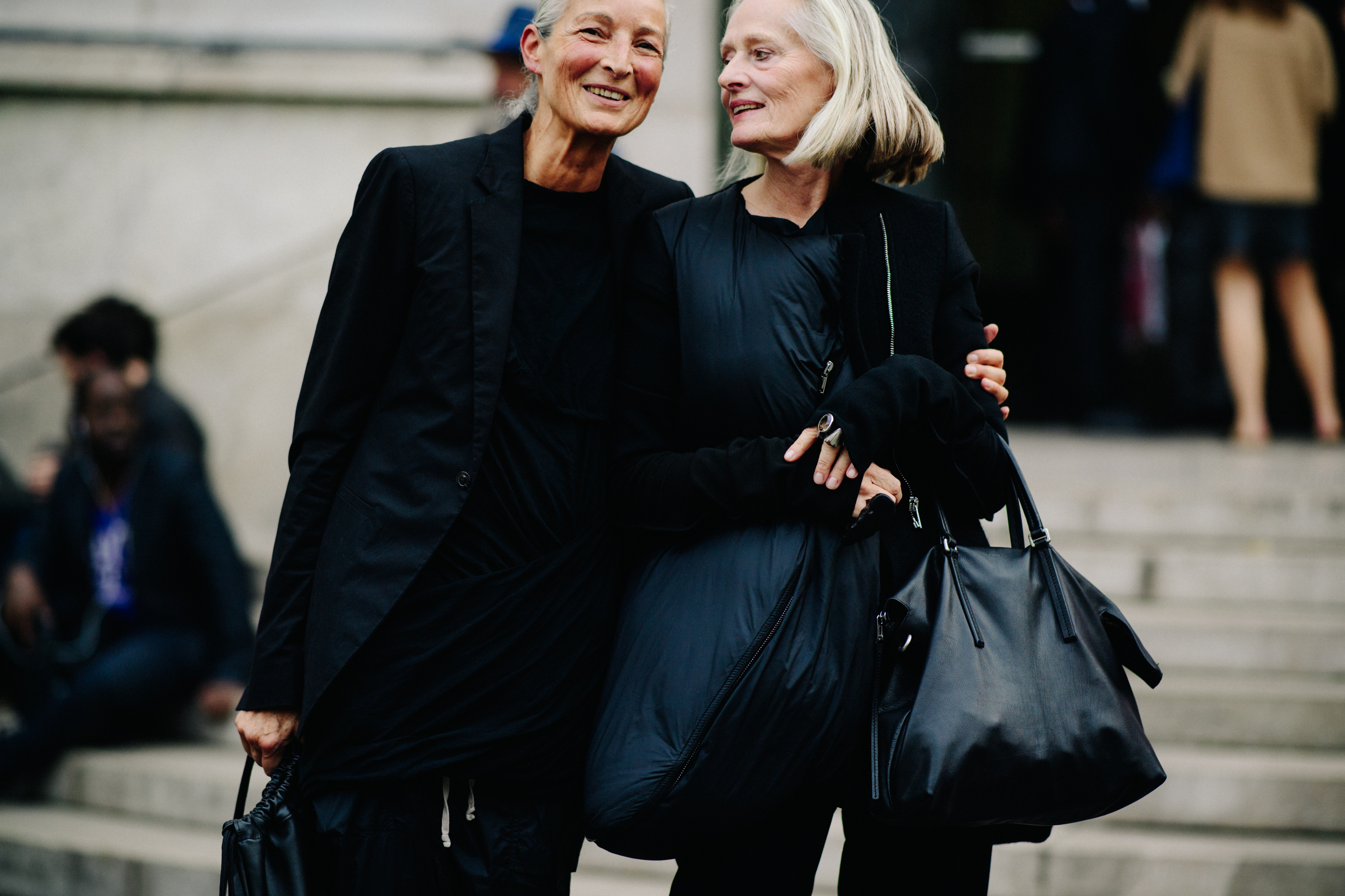 Two women wearing all black