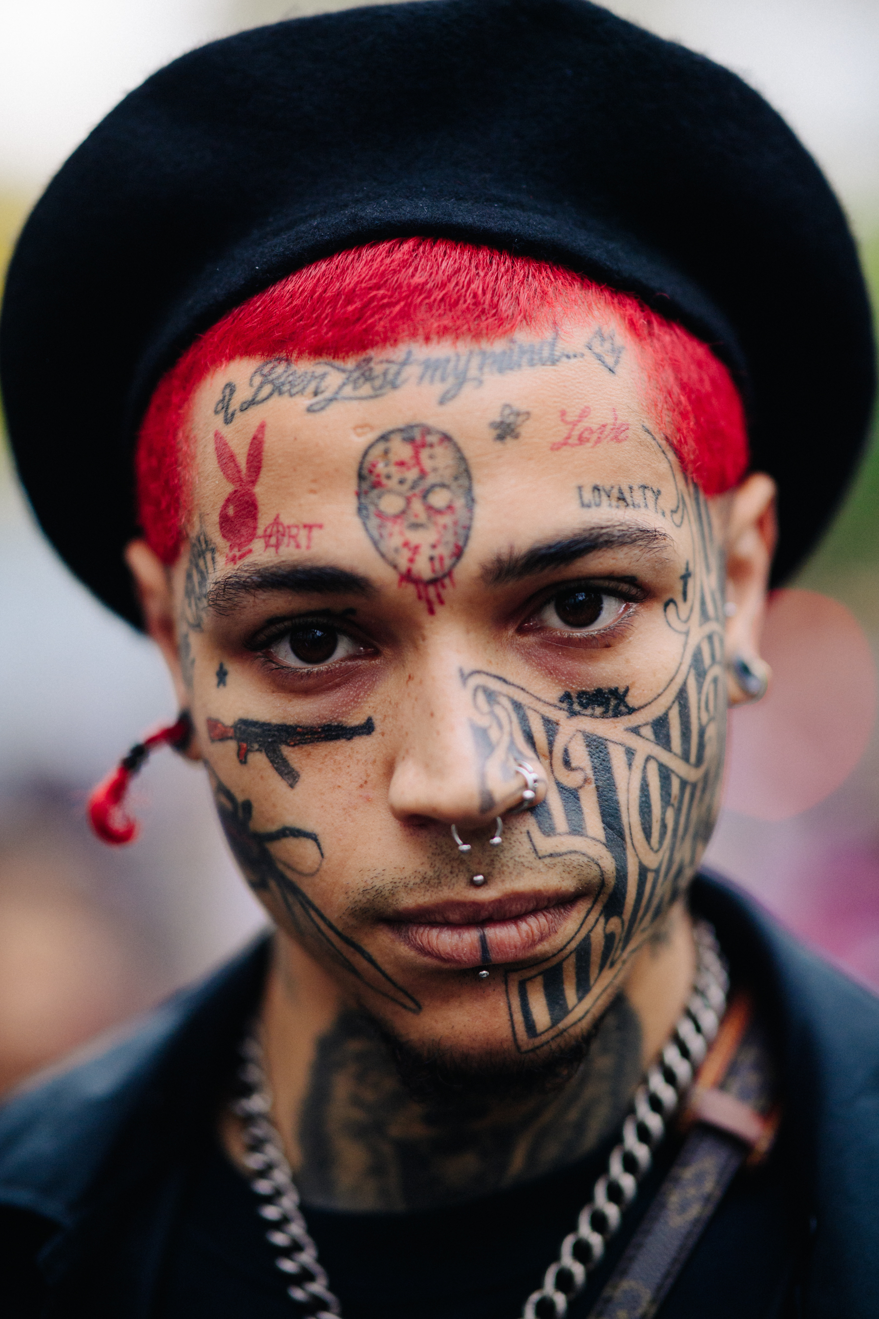 Heavily tattooed man with red hair
