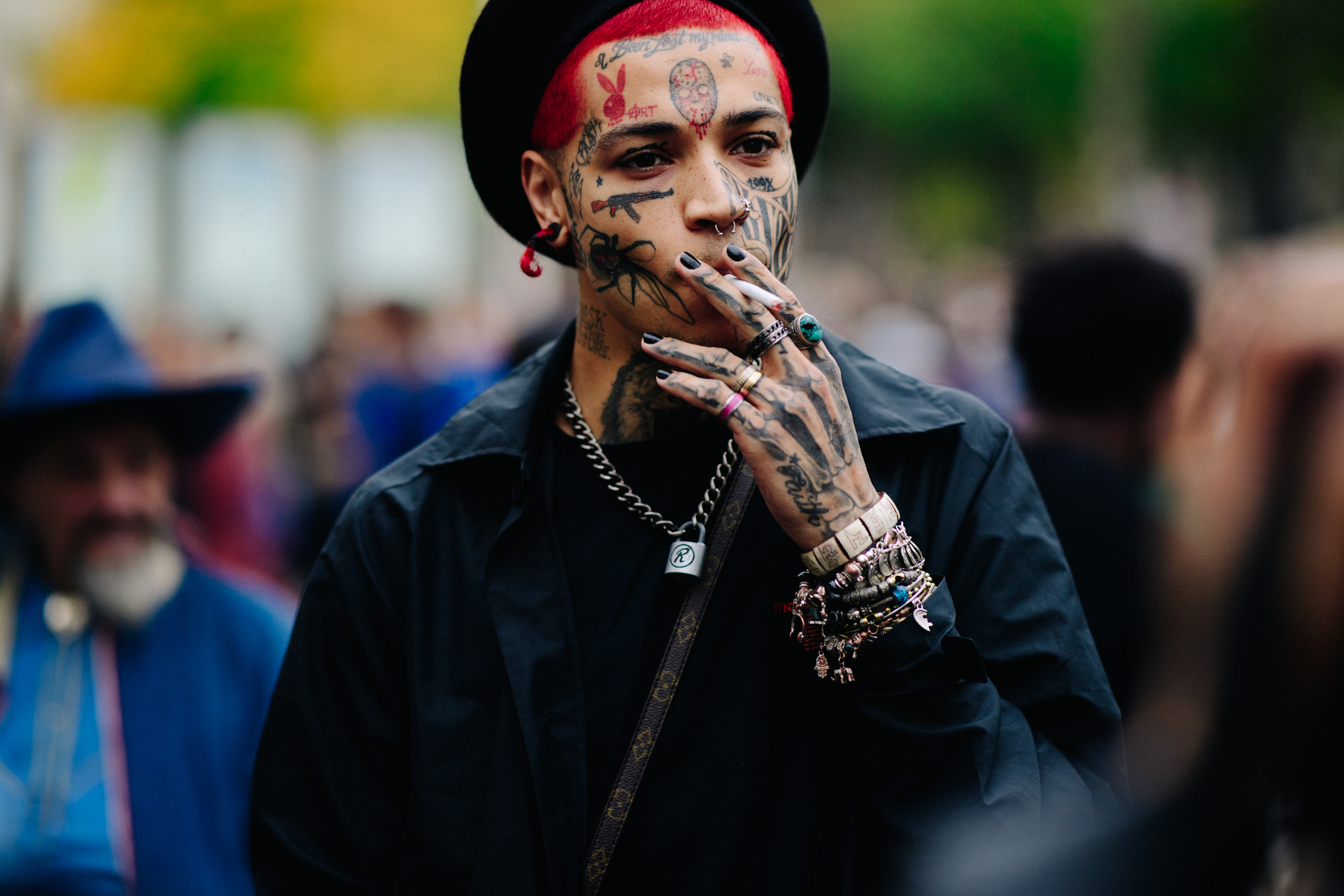 Heavily tattooed man with red hair