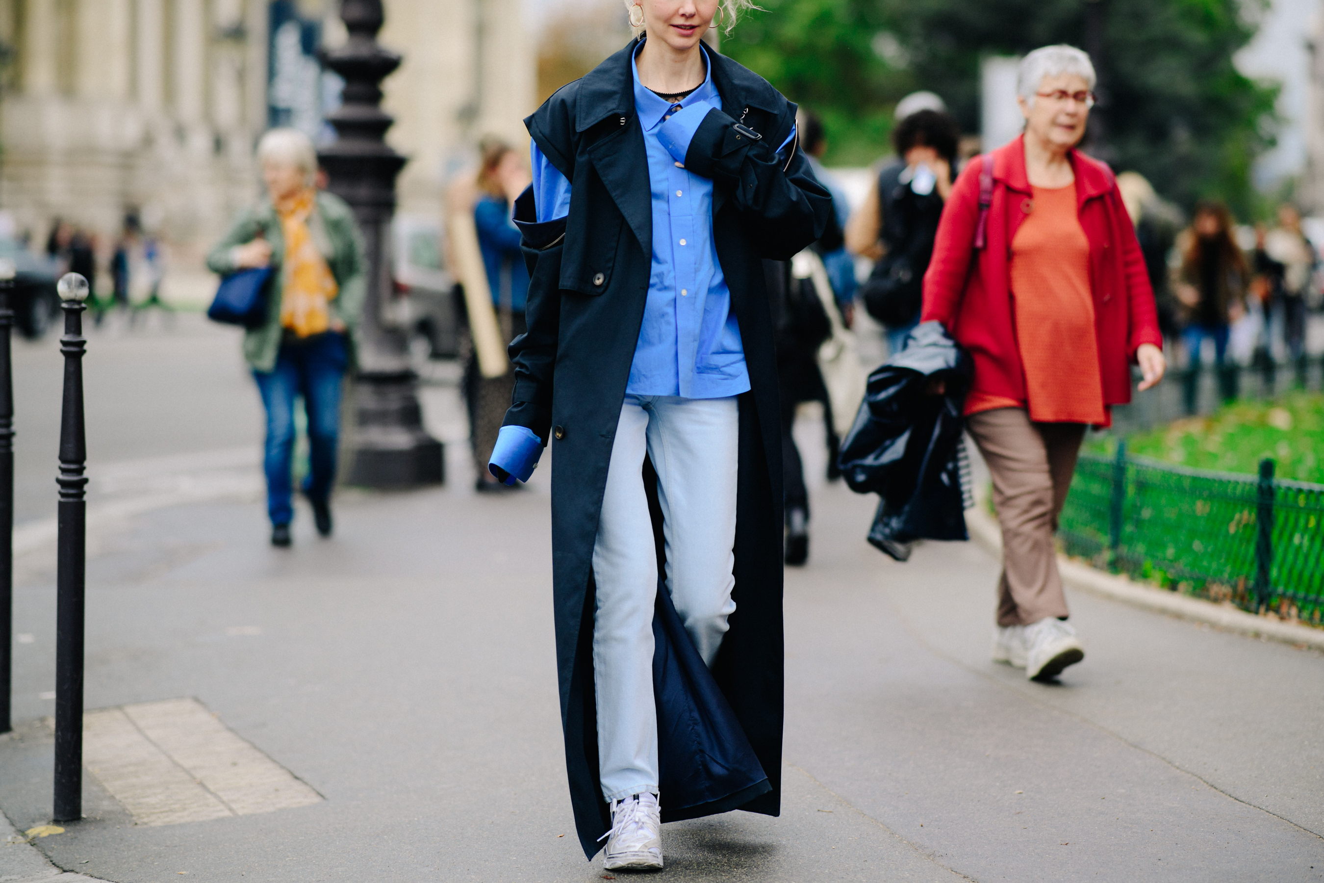 Russian KM20 store owner wearing long coat