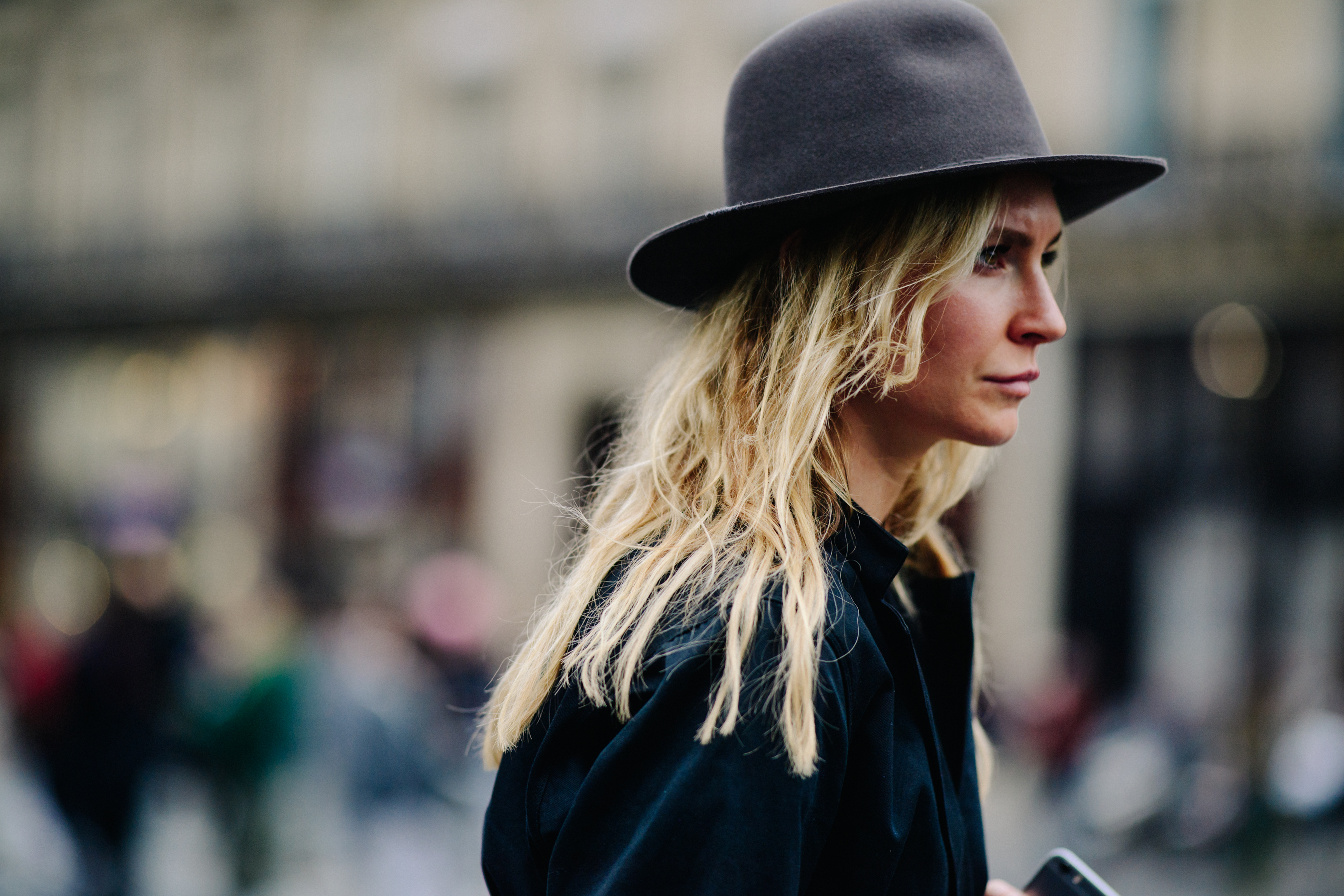 Woman wearing gray hat