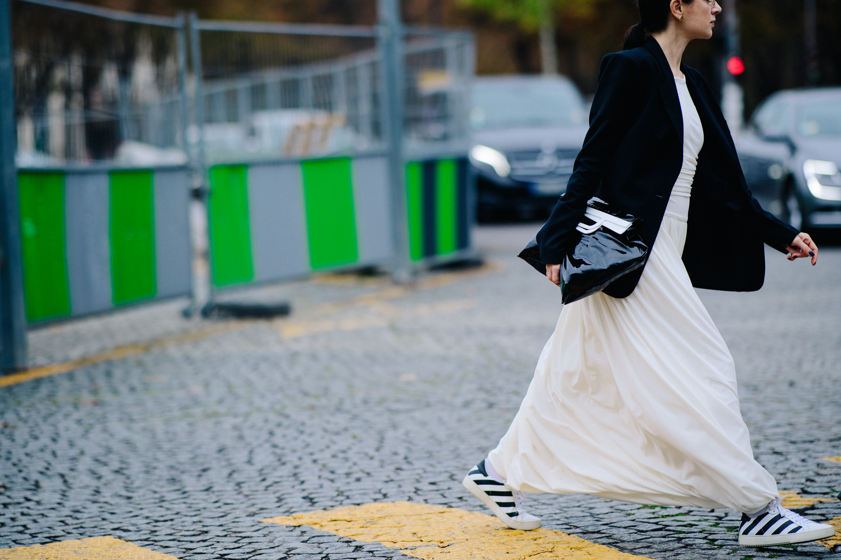Ukrainian designer wearing long white dress