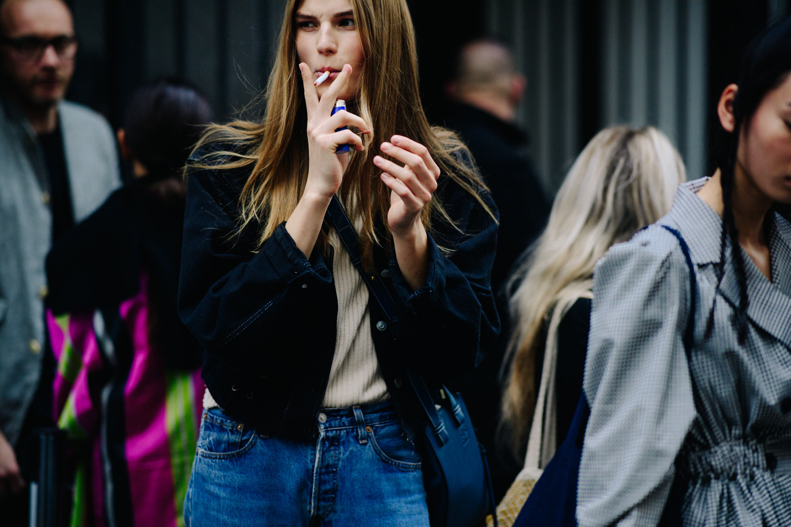 Model smoking after a show