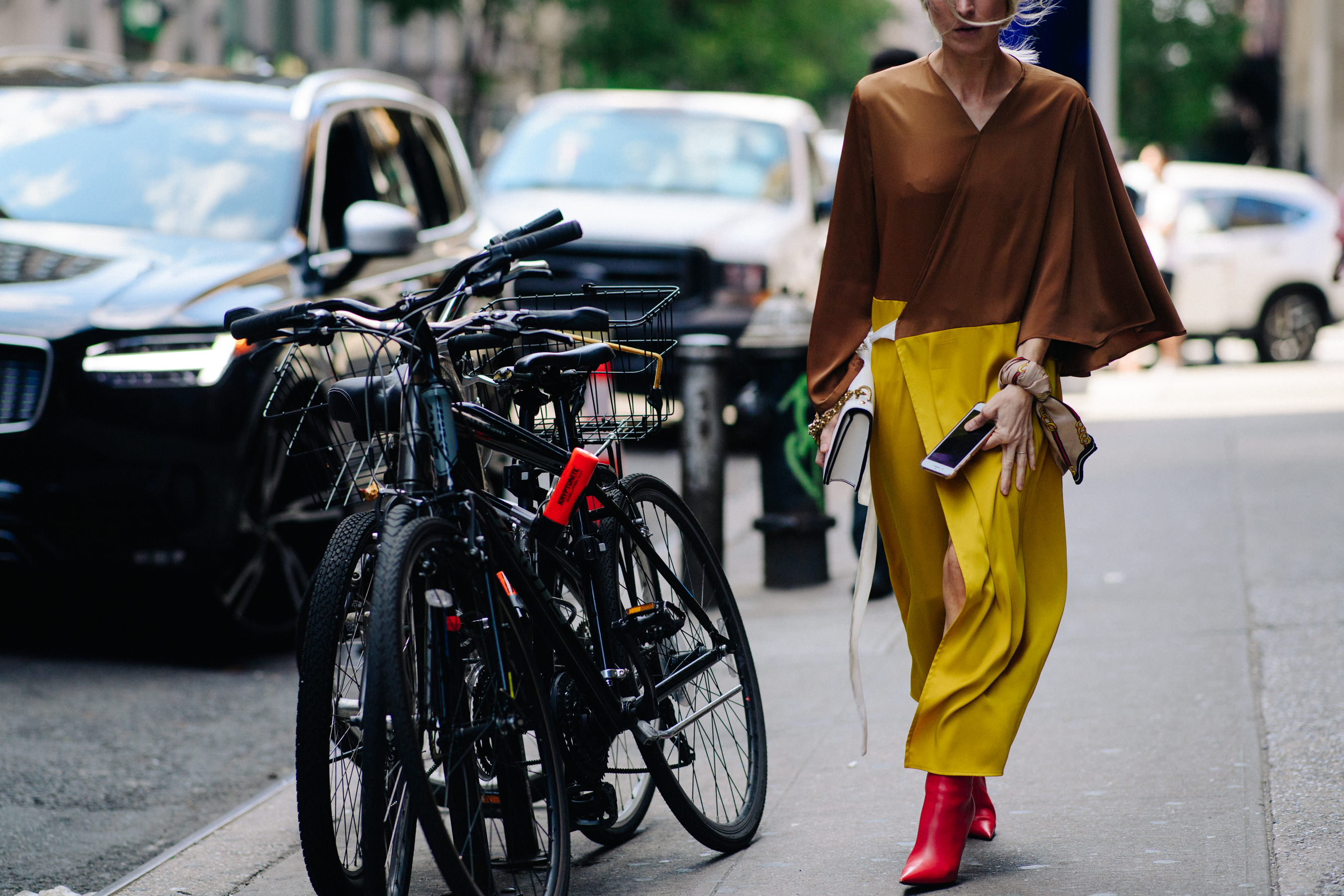 Woman wearing brown and yellow dress