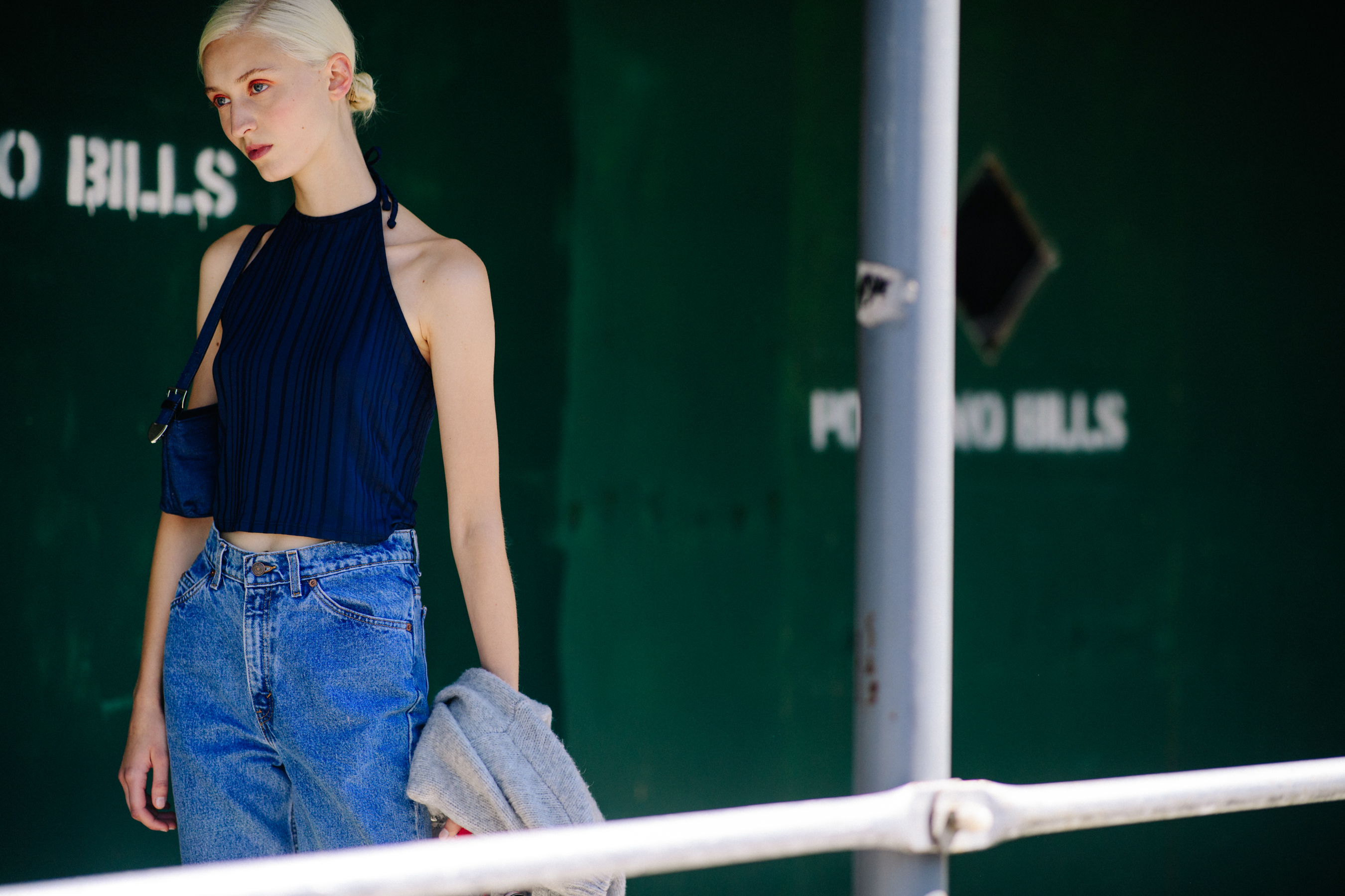Model wearing blue top