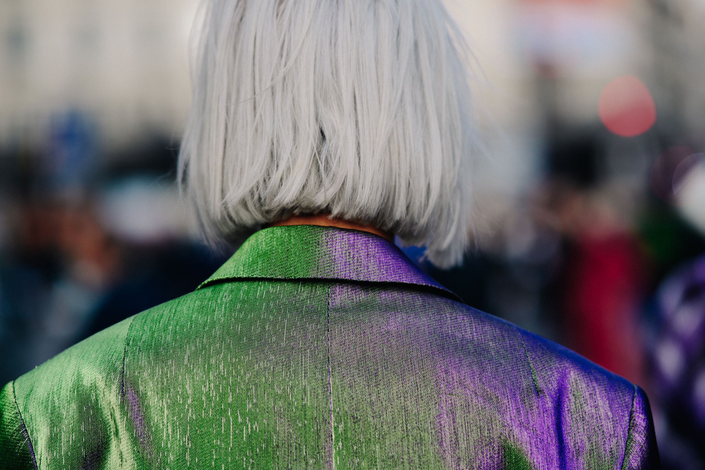 Woman with short gray hair after a show