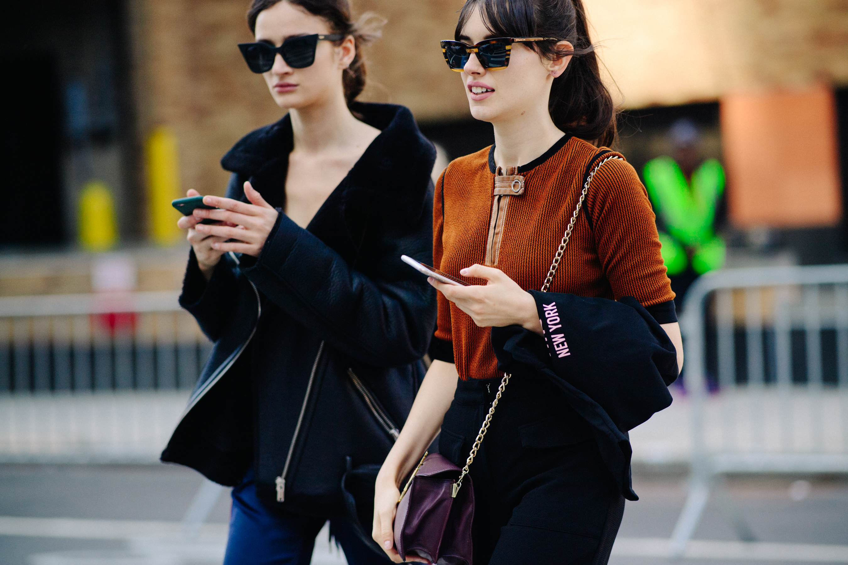 Two models wearing sunglasses