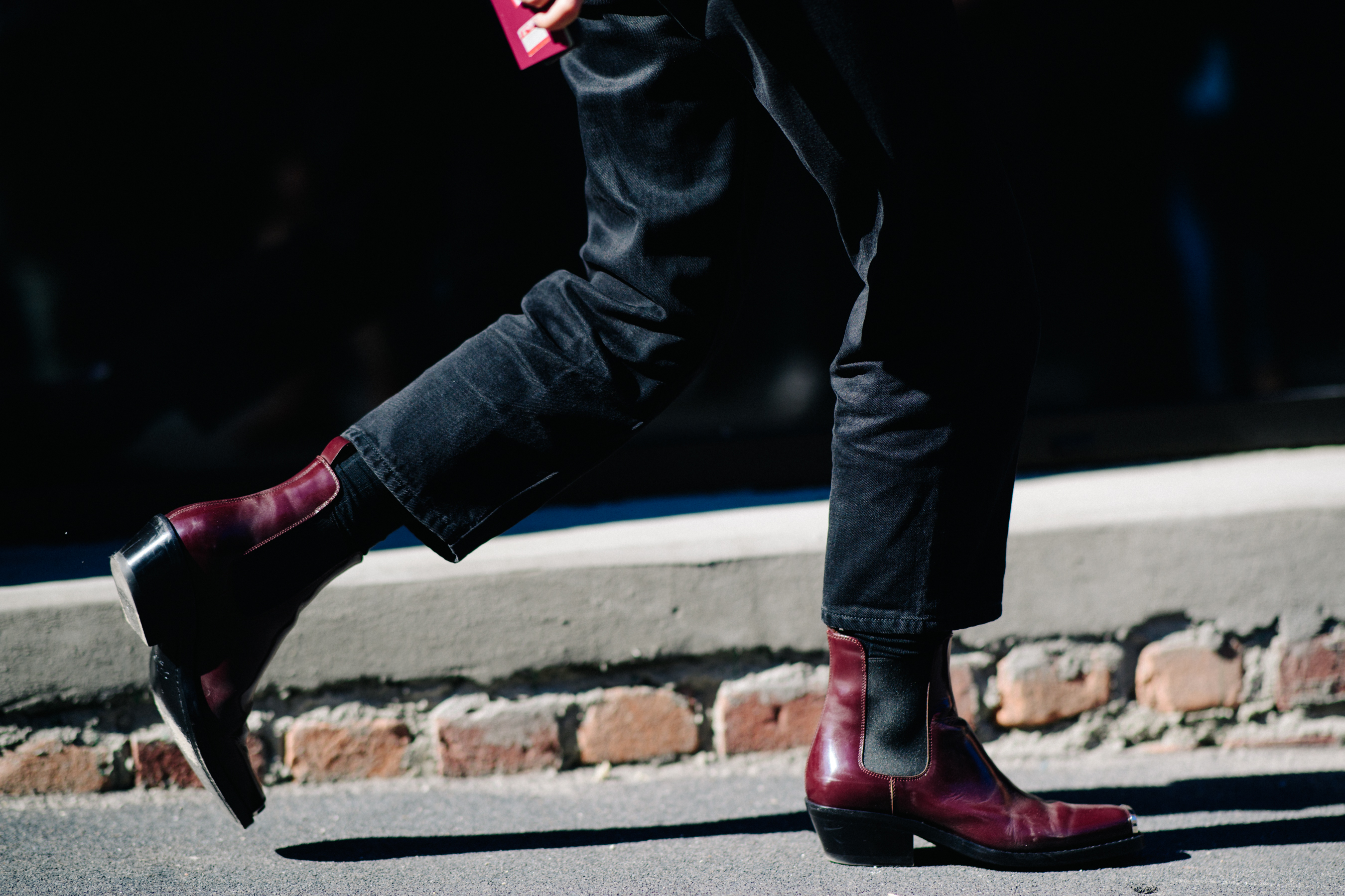 Closeup of man in red boots