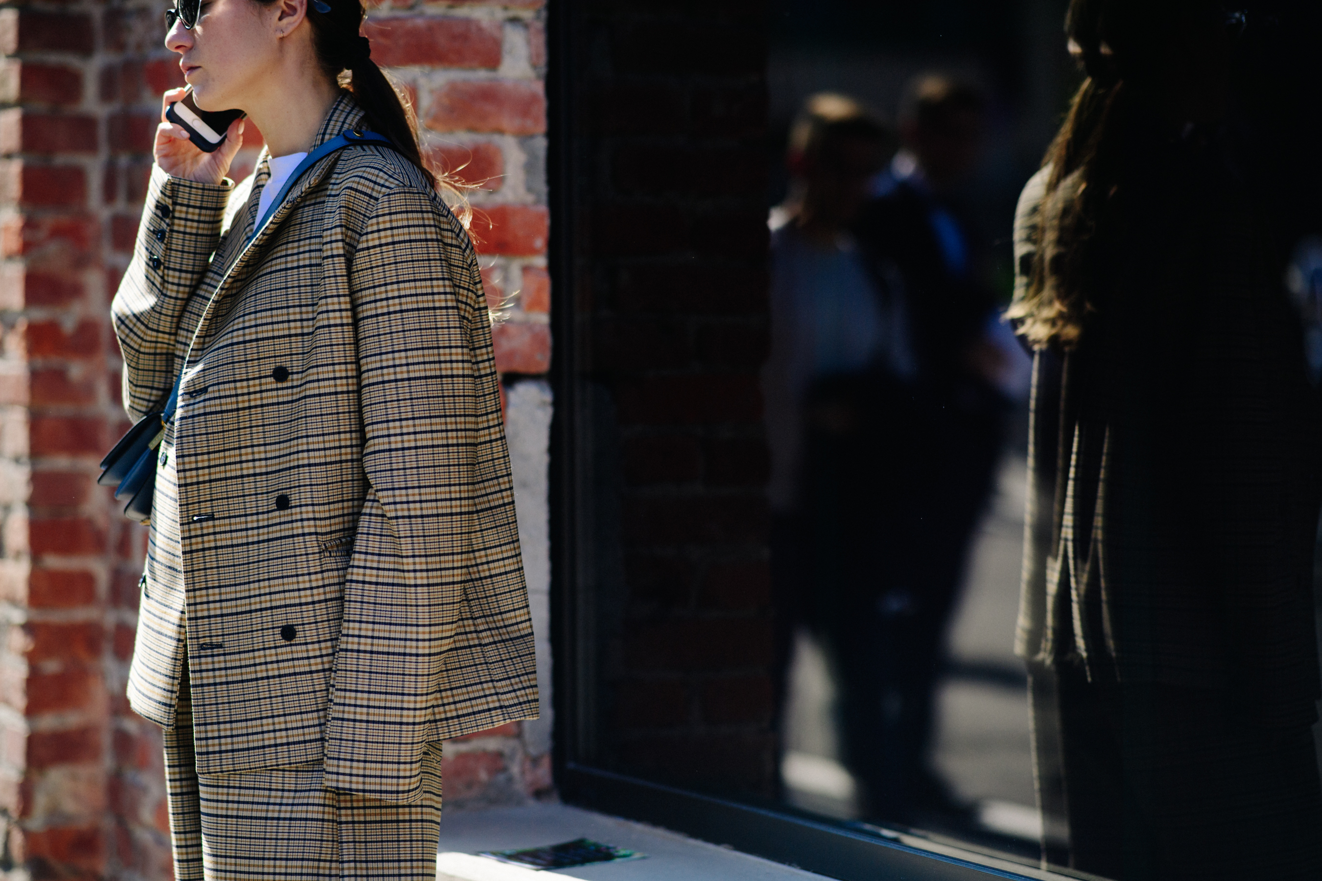 Woman wearing check suit