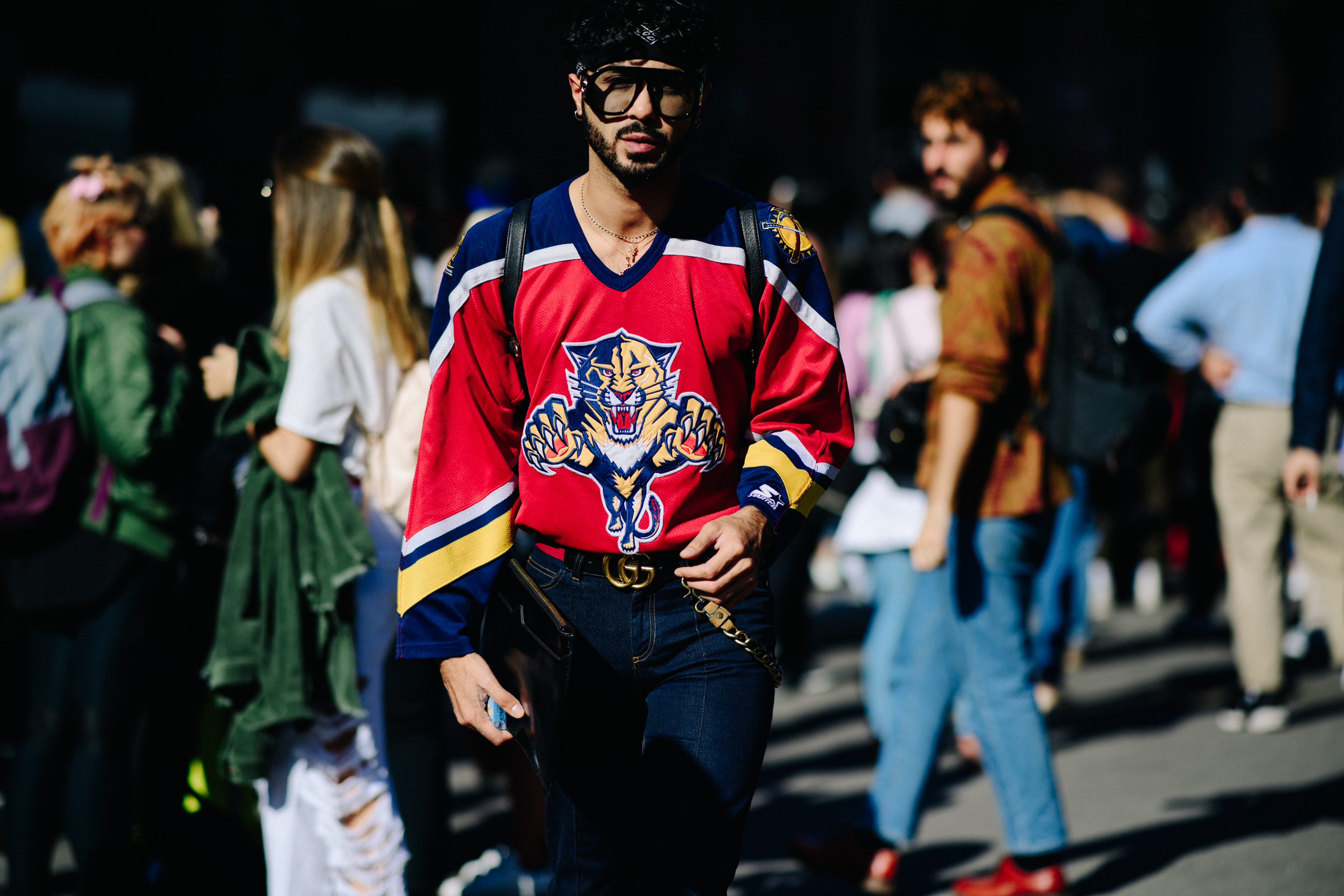 Man wearing red sports jersey