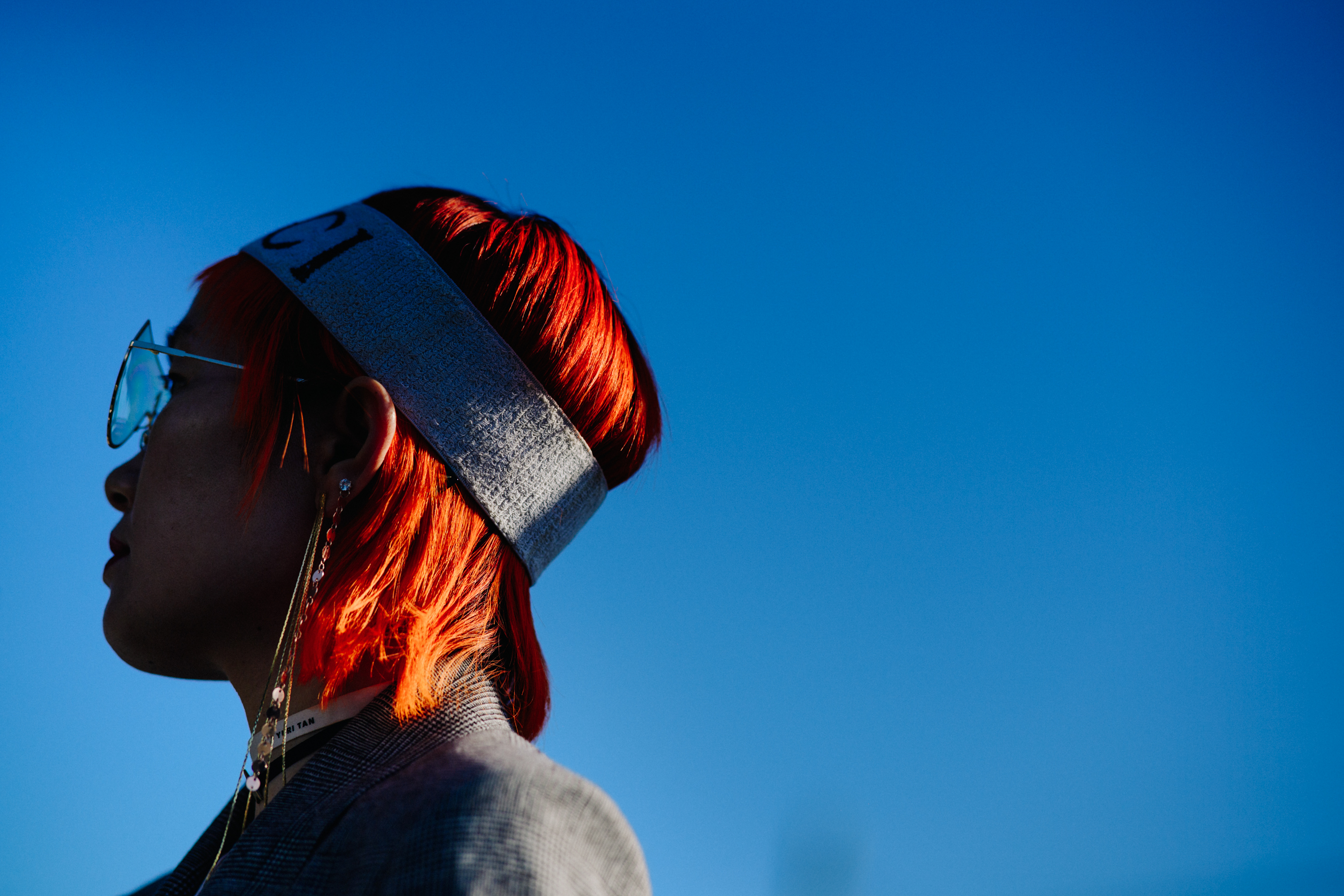 Closeup of Asian woman with red hair