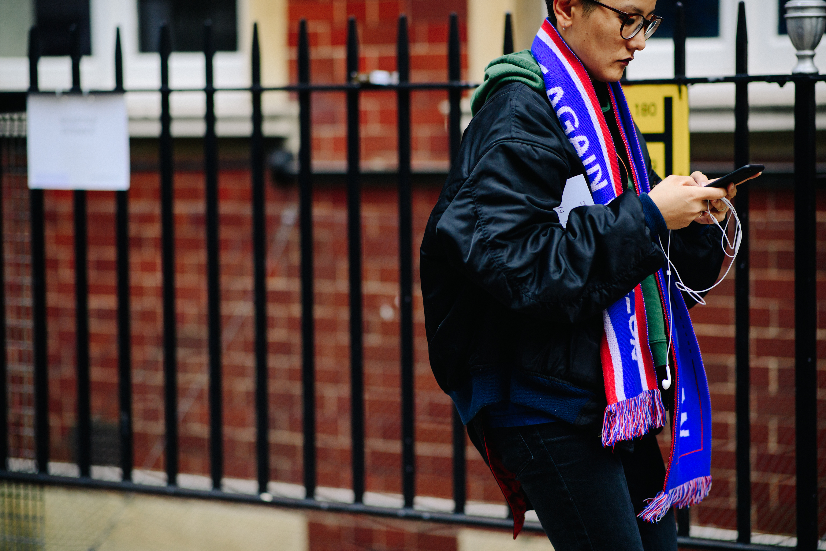 Woman wearing football scarf