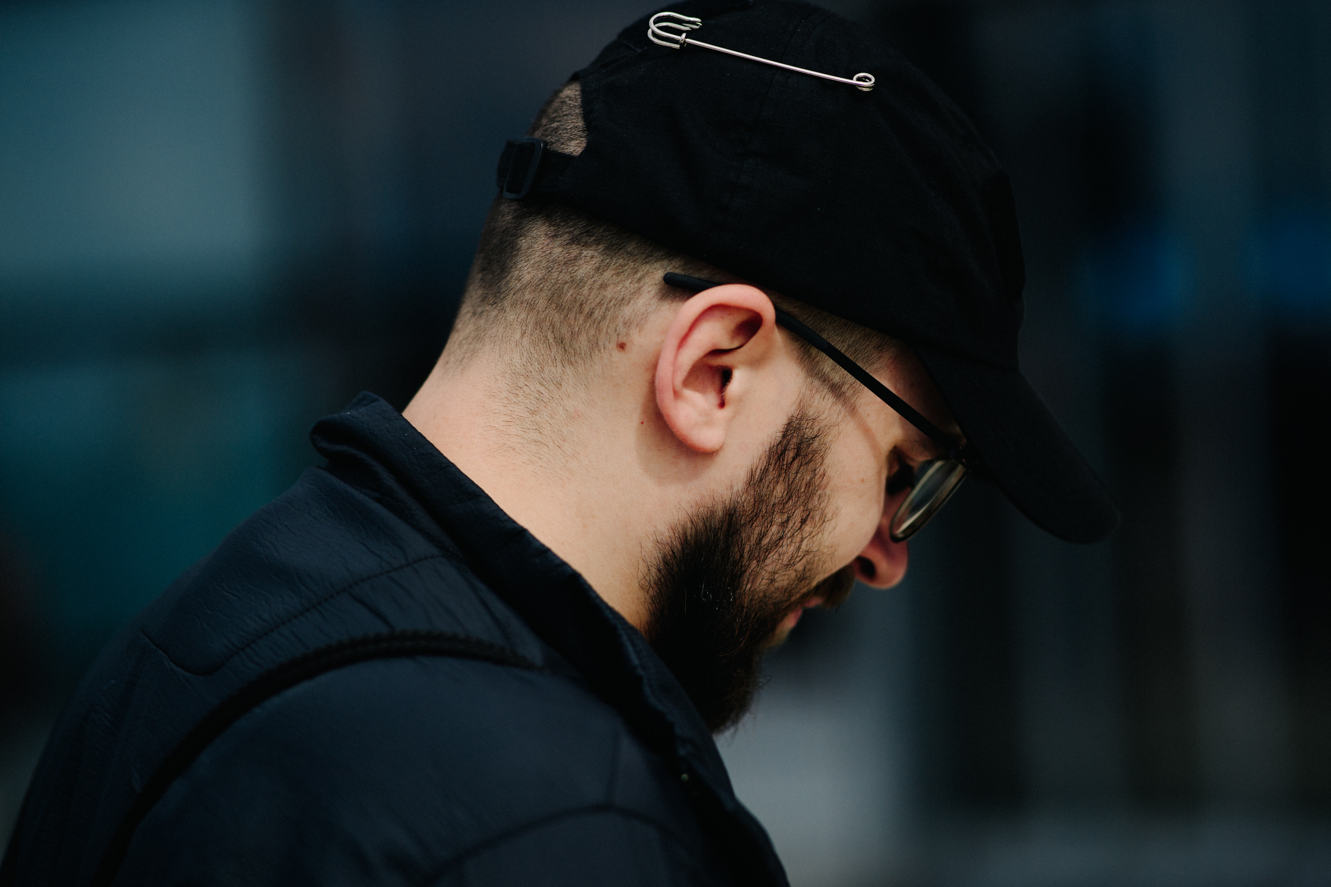 Man wearing black hat