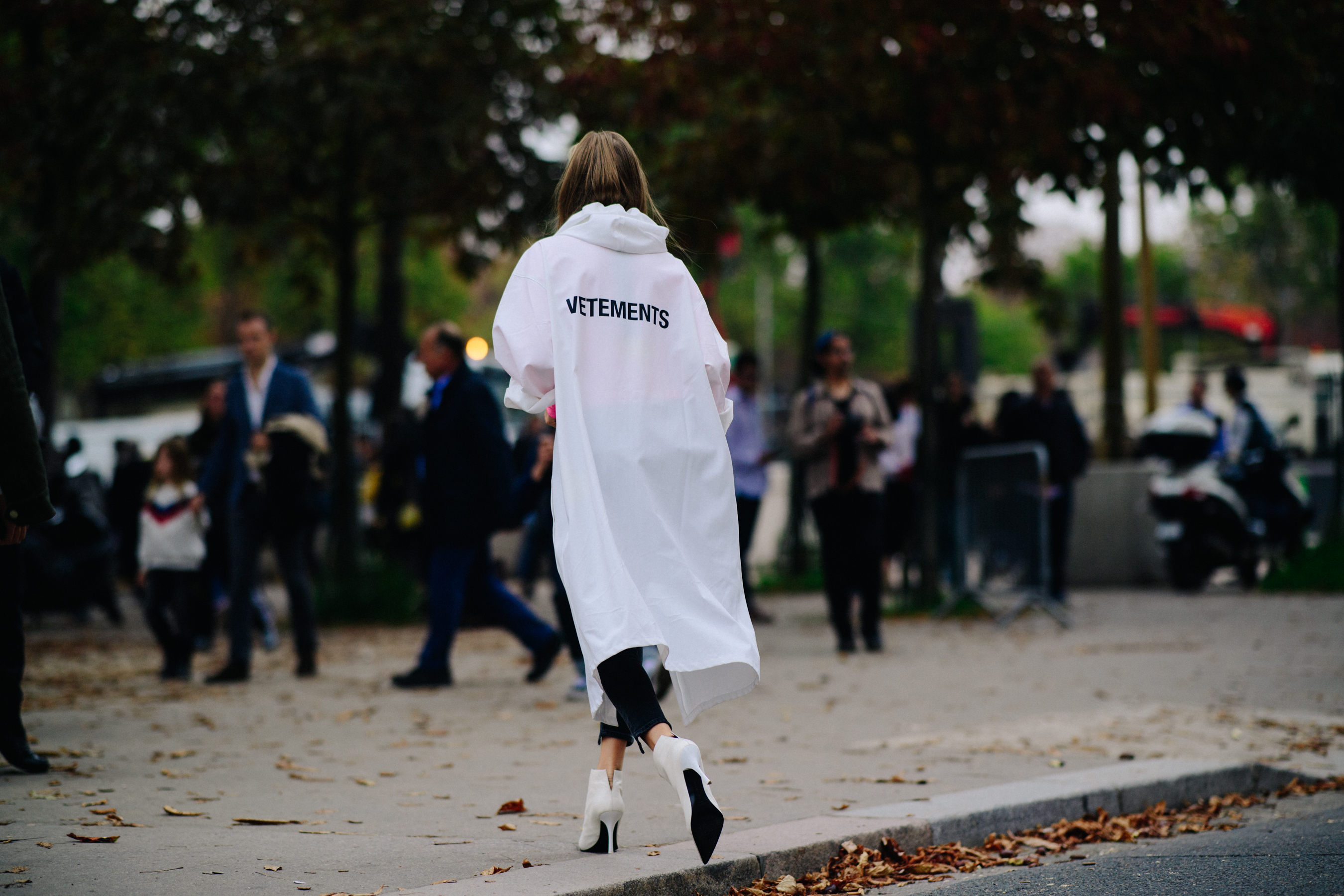 Woman wearing Vetements rain coat