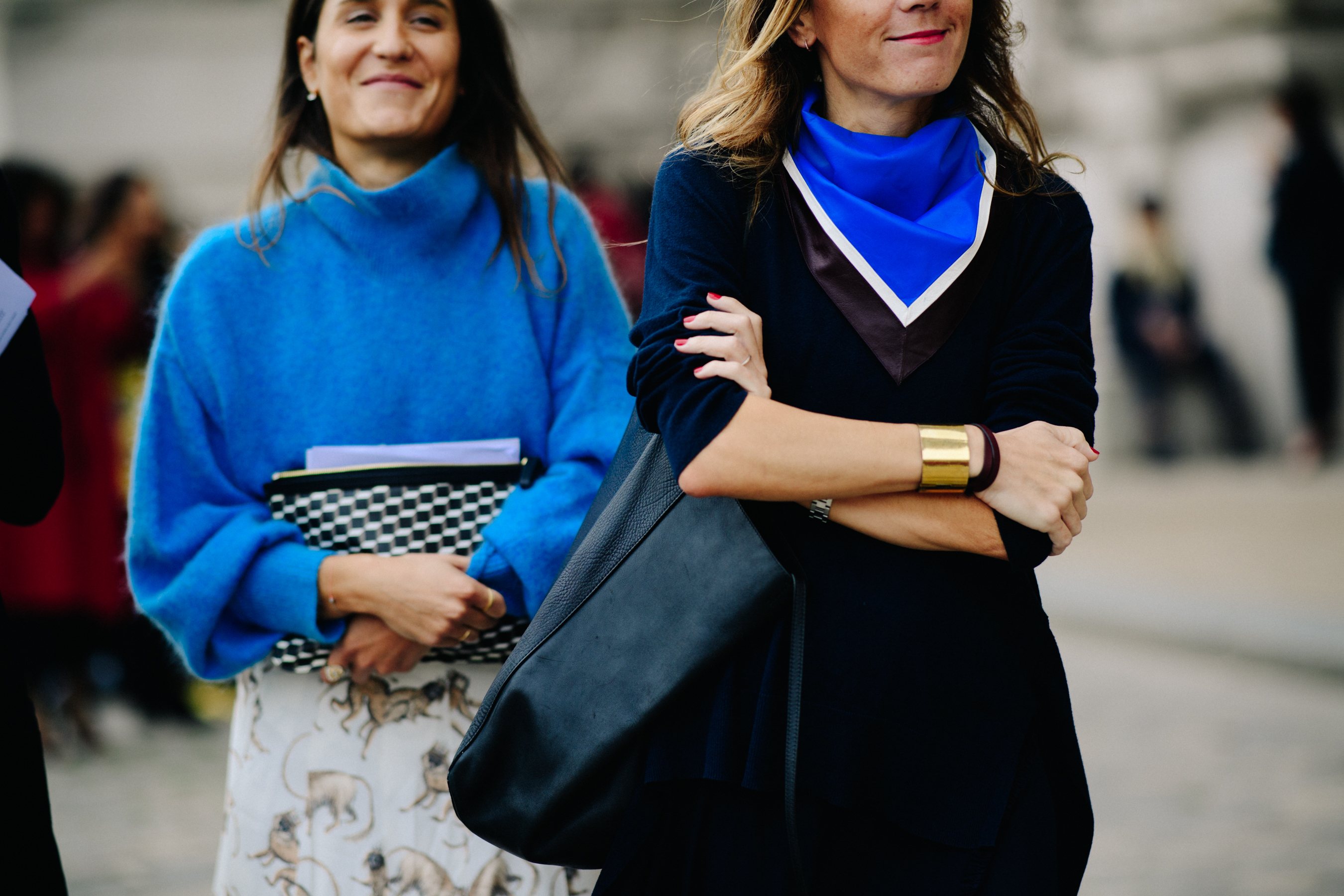 Two women wearing blue before a show