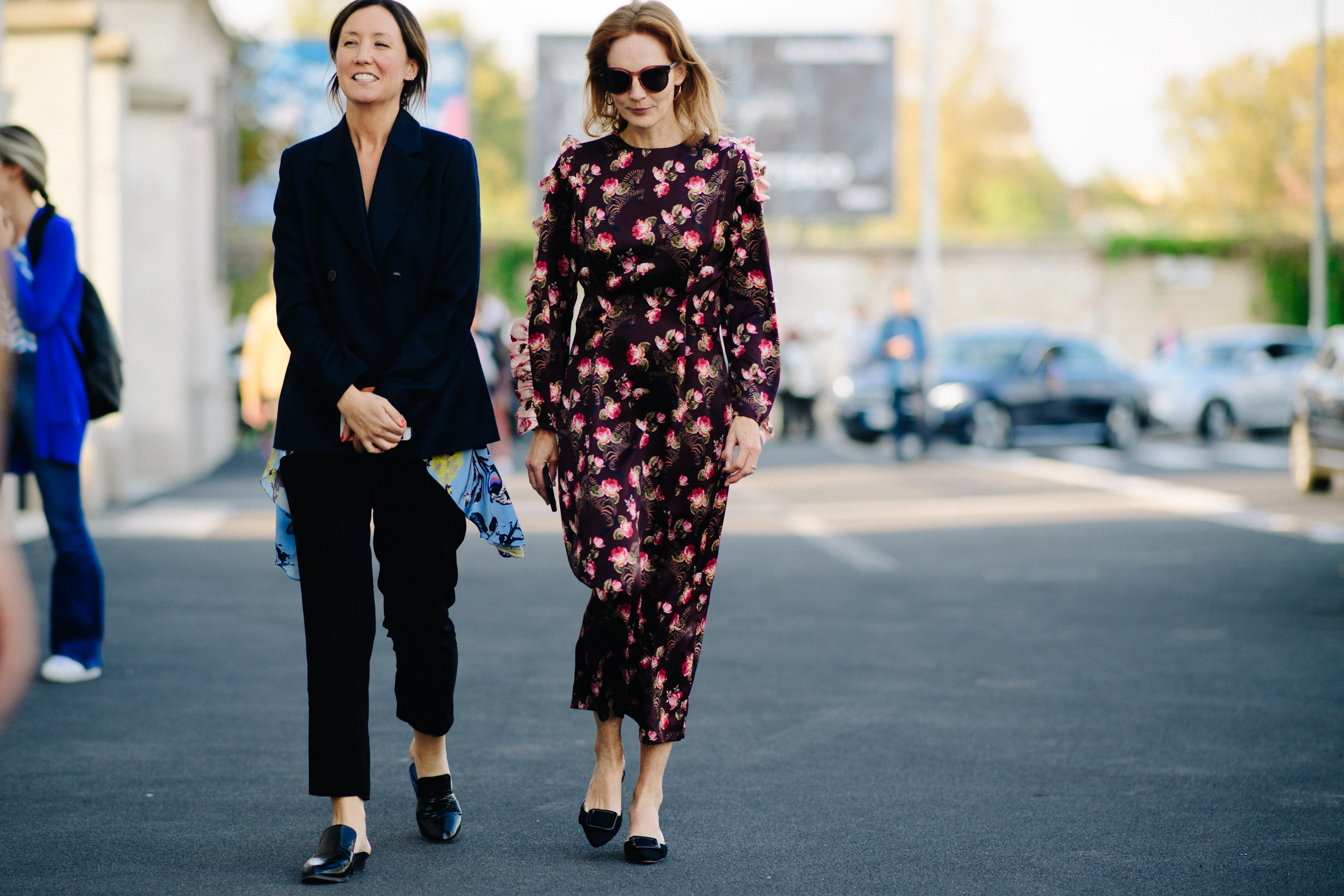 Two women in full length outfits
