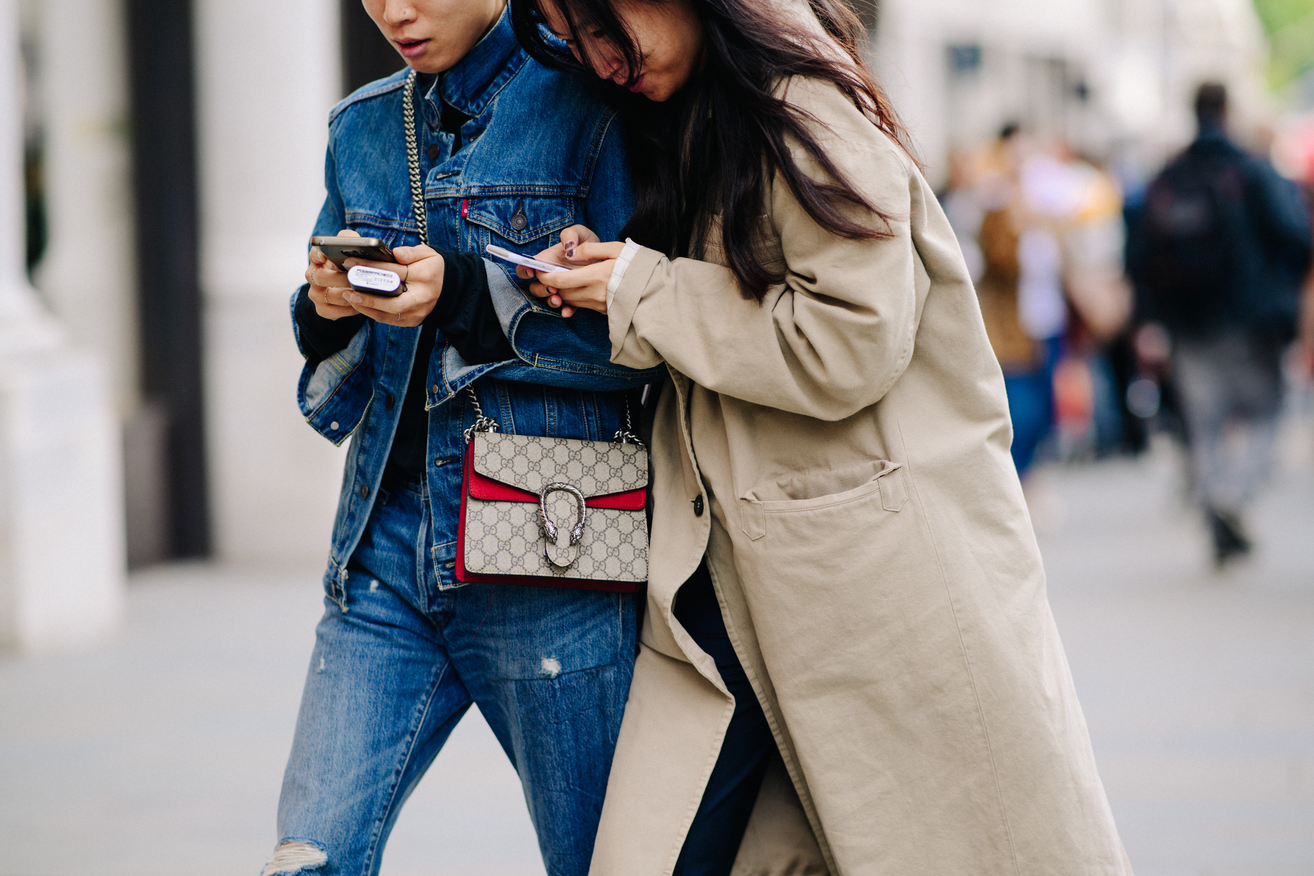 Woman wearing denim Levi's suit and Gucci