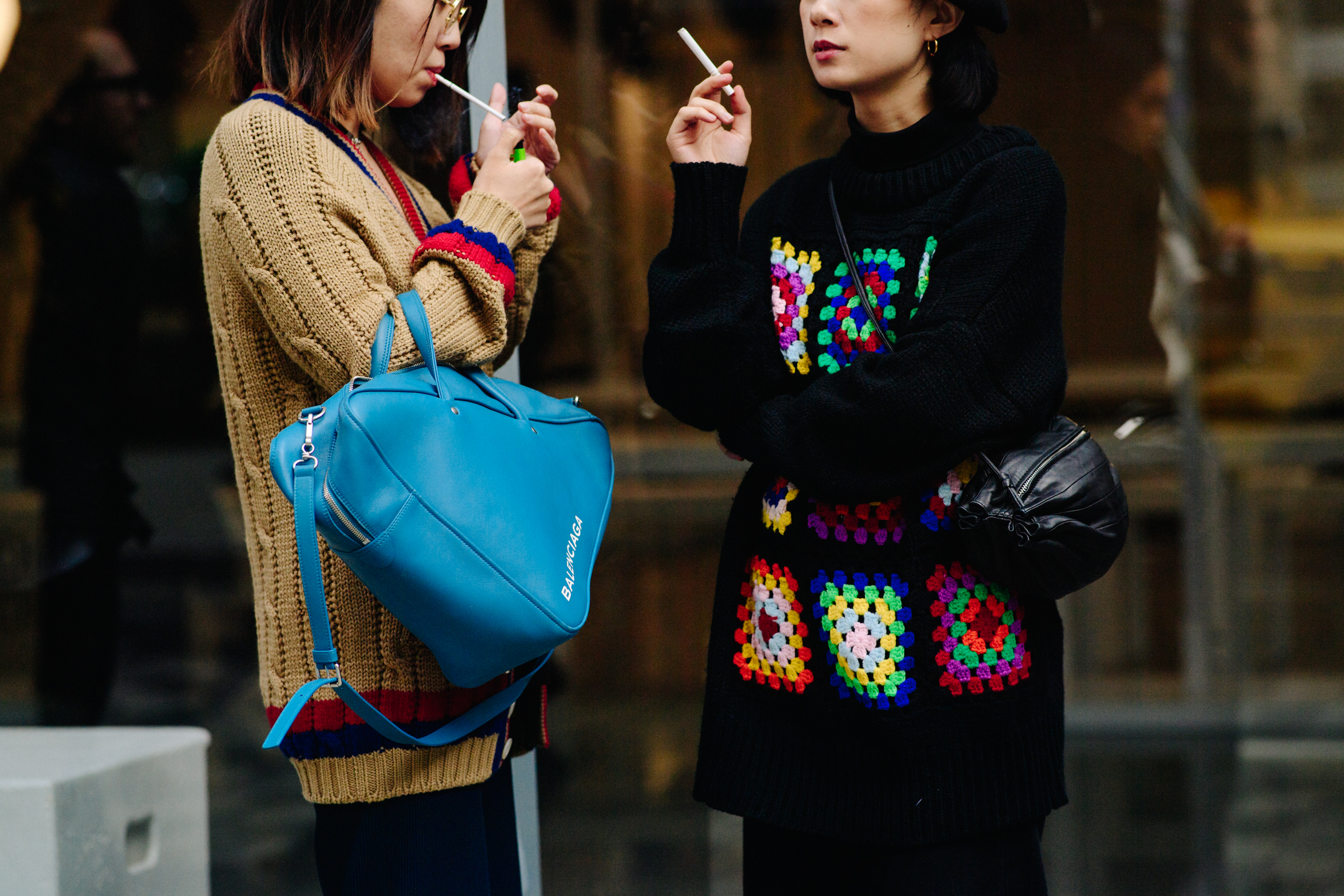 Two women wearing Balenciaga and J.W.Anderson