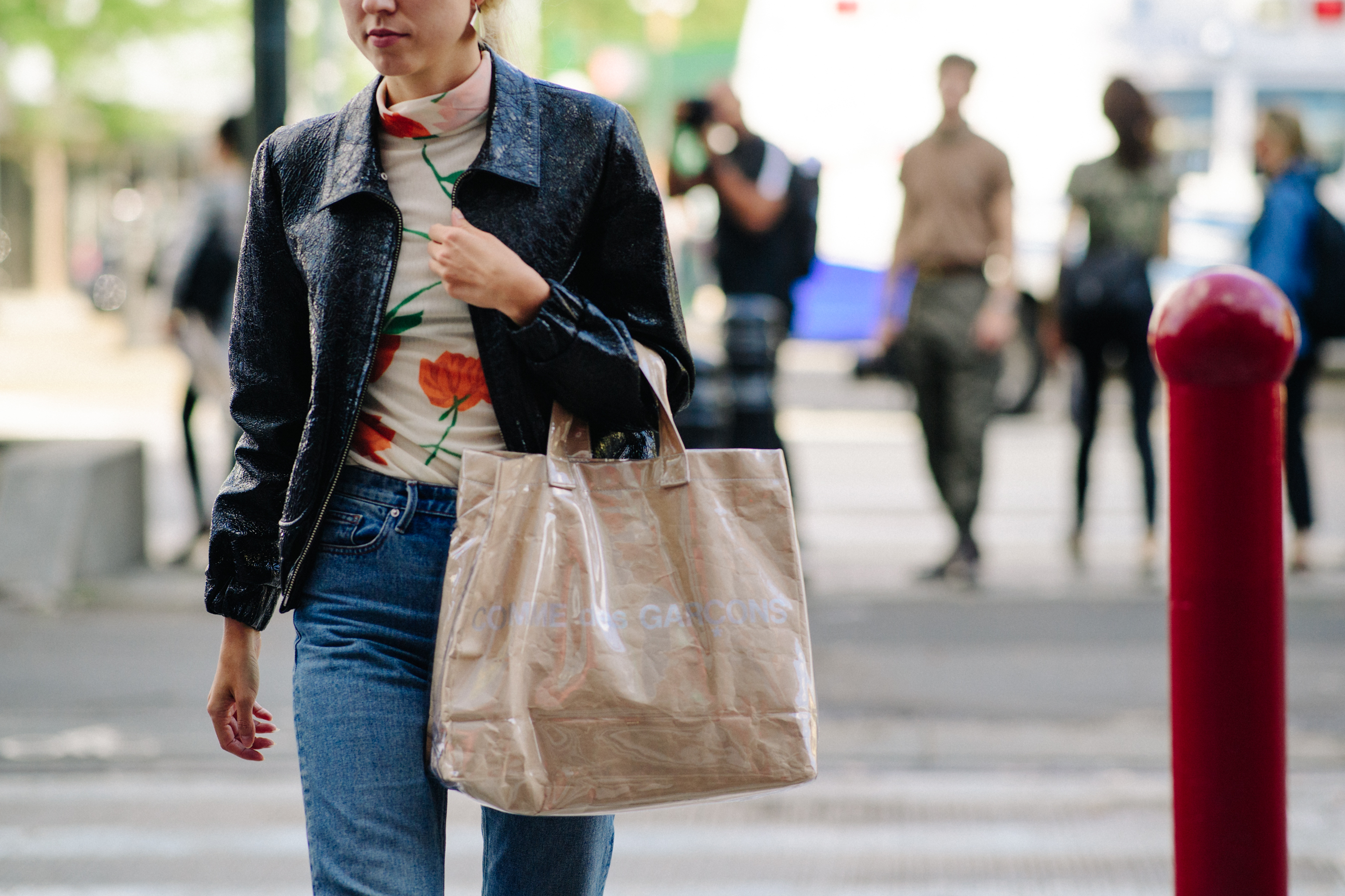 Woman wearing Comme des Garcons bag