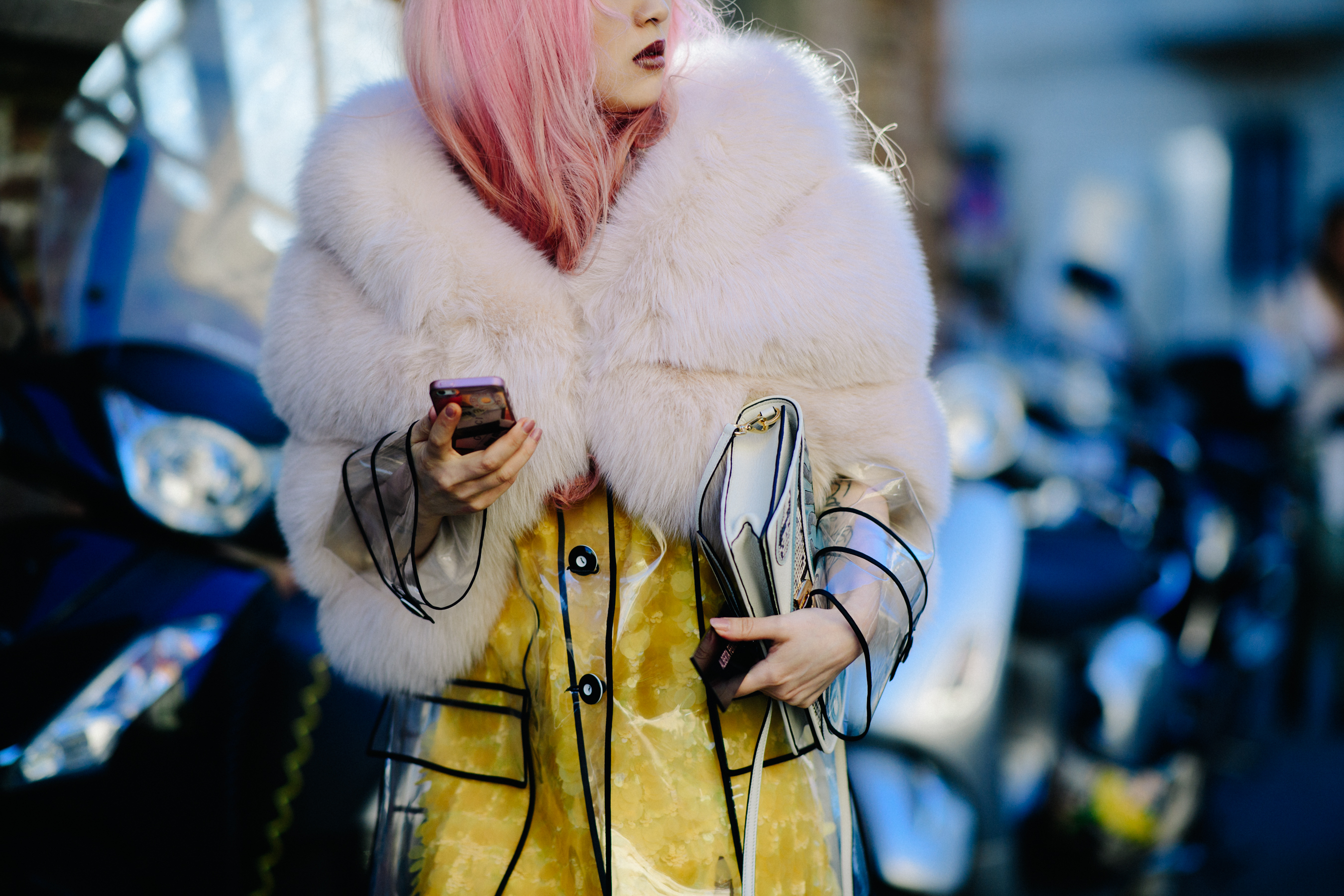 Woman with pink hair and fur jacket