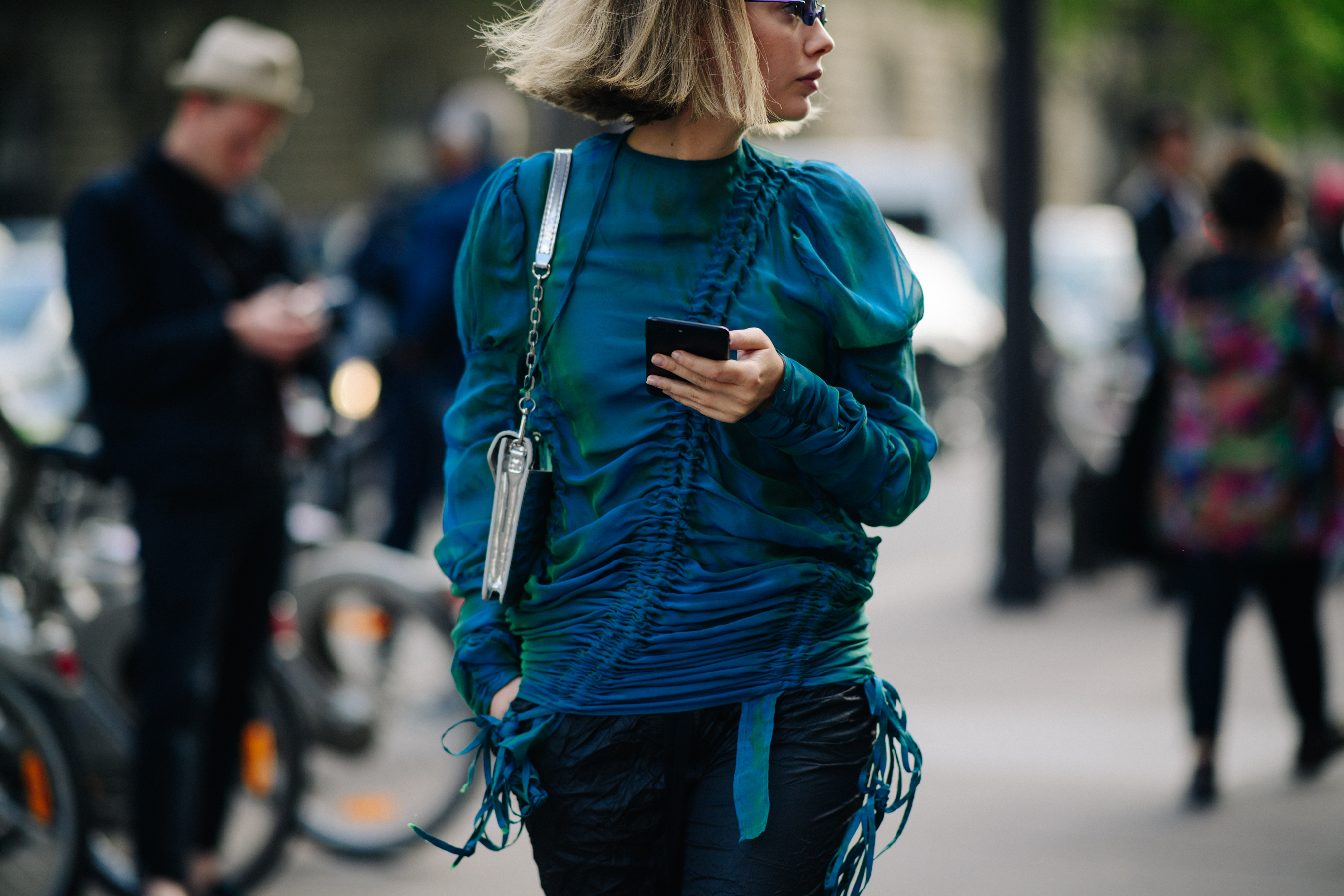 Woman wearing blue top after a show