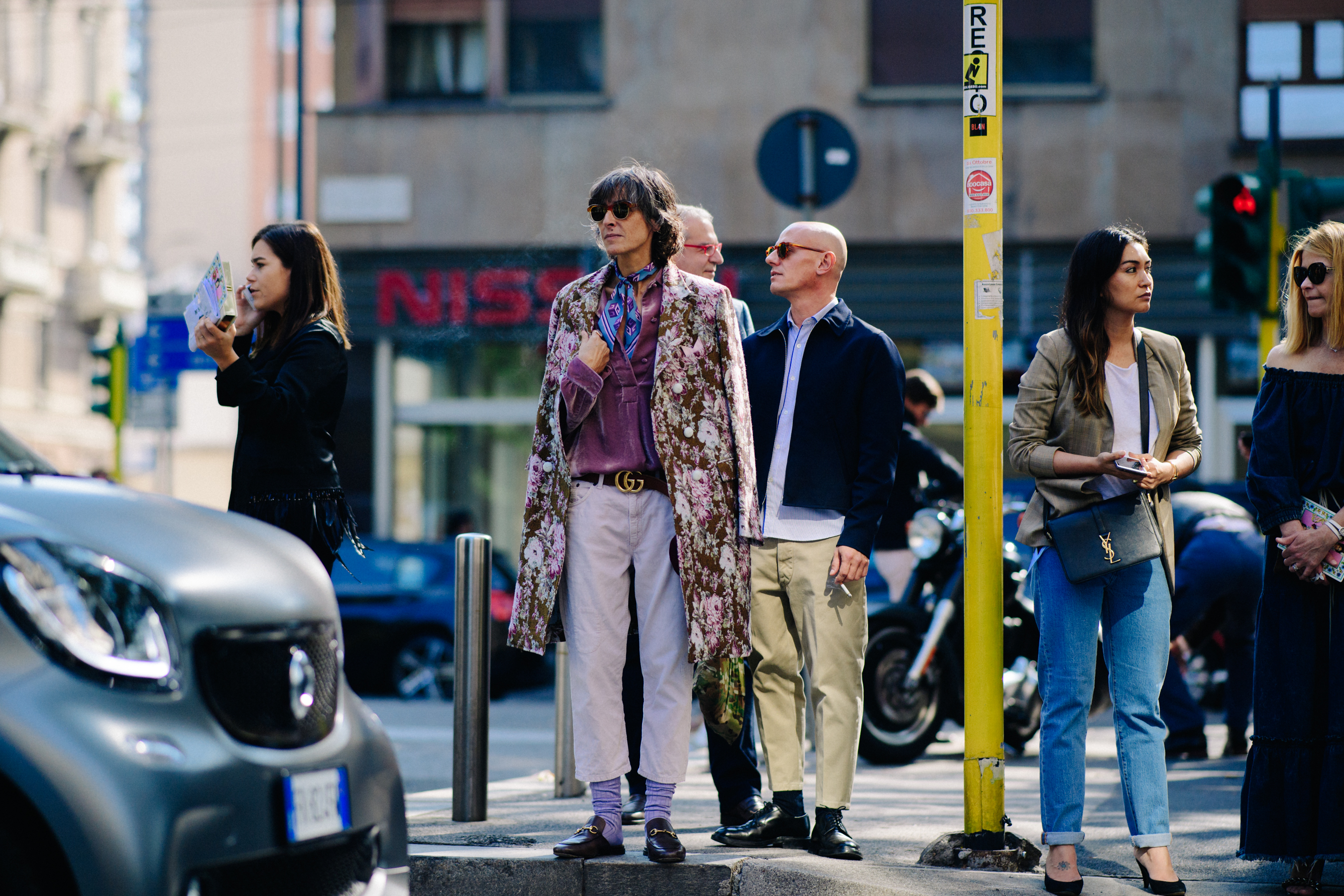 Italian woman wearing Gucci belt