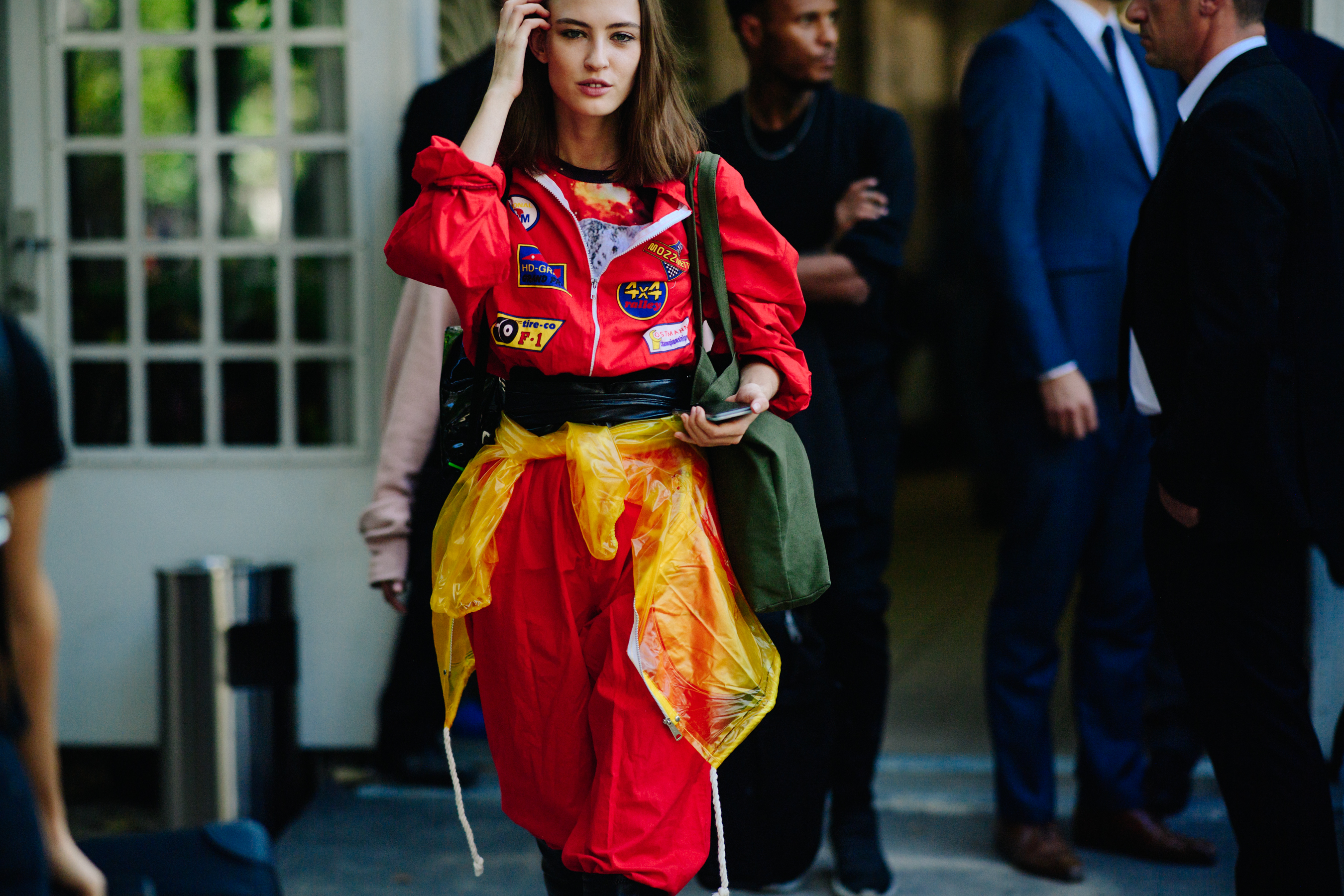 Russian mdoel wearing red oufit