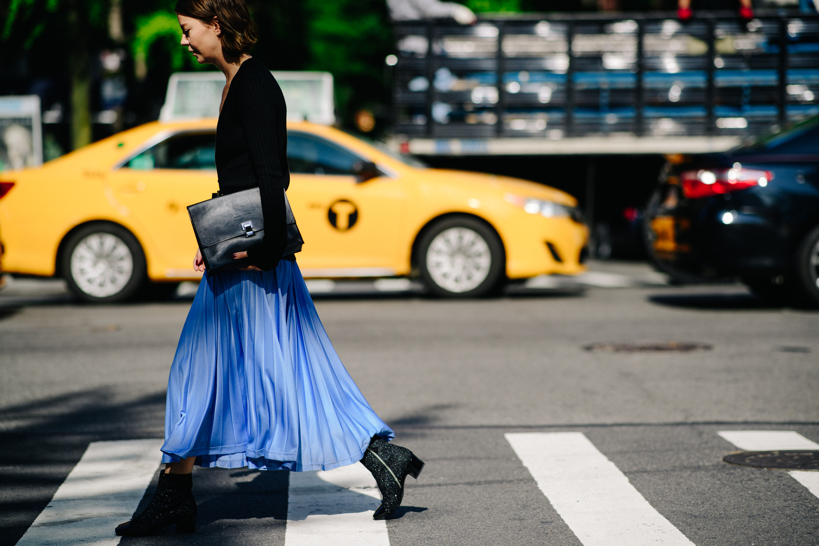 Stylist wearing blue skirt