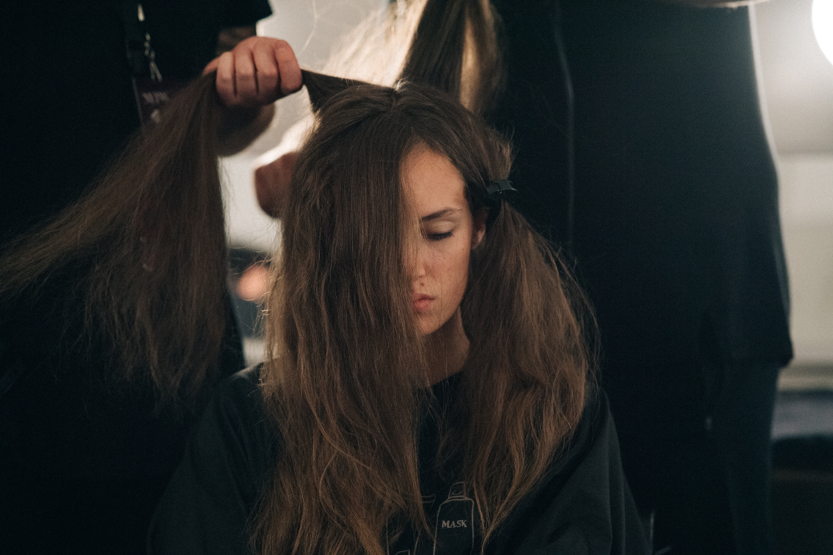 Model getting hair and make up done