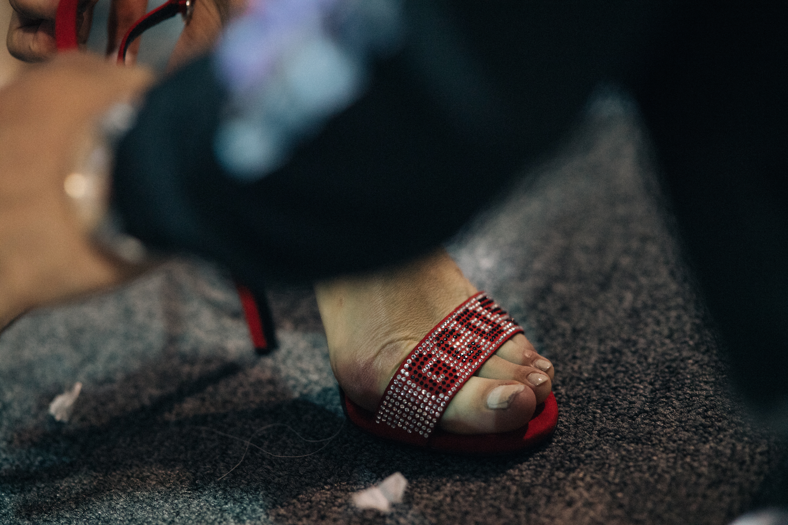Model wearing shoes with crystals