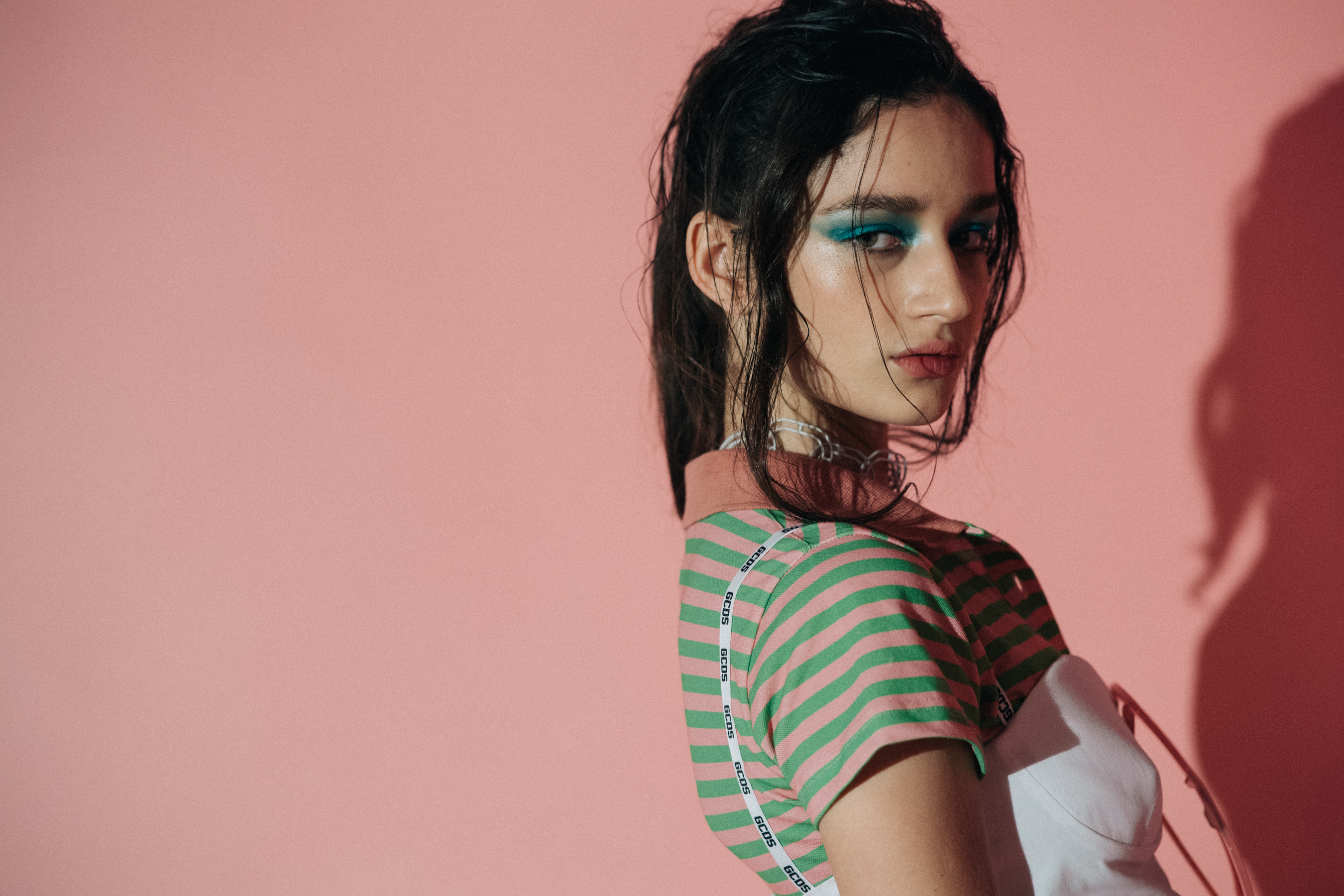 Model wearing colourful clothes