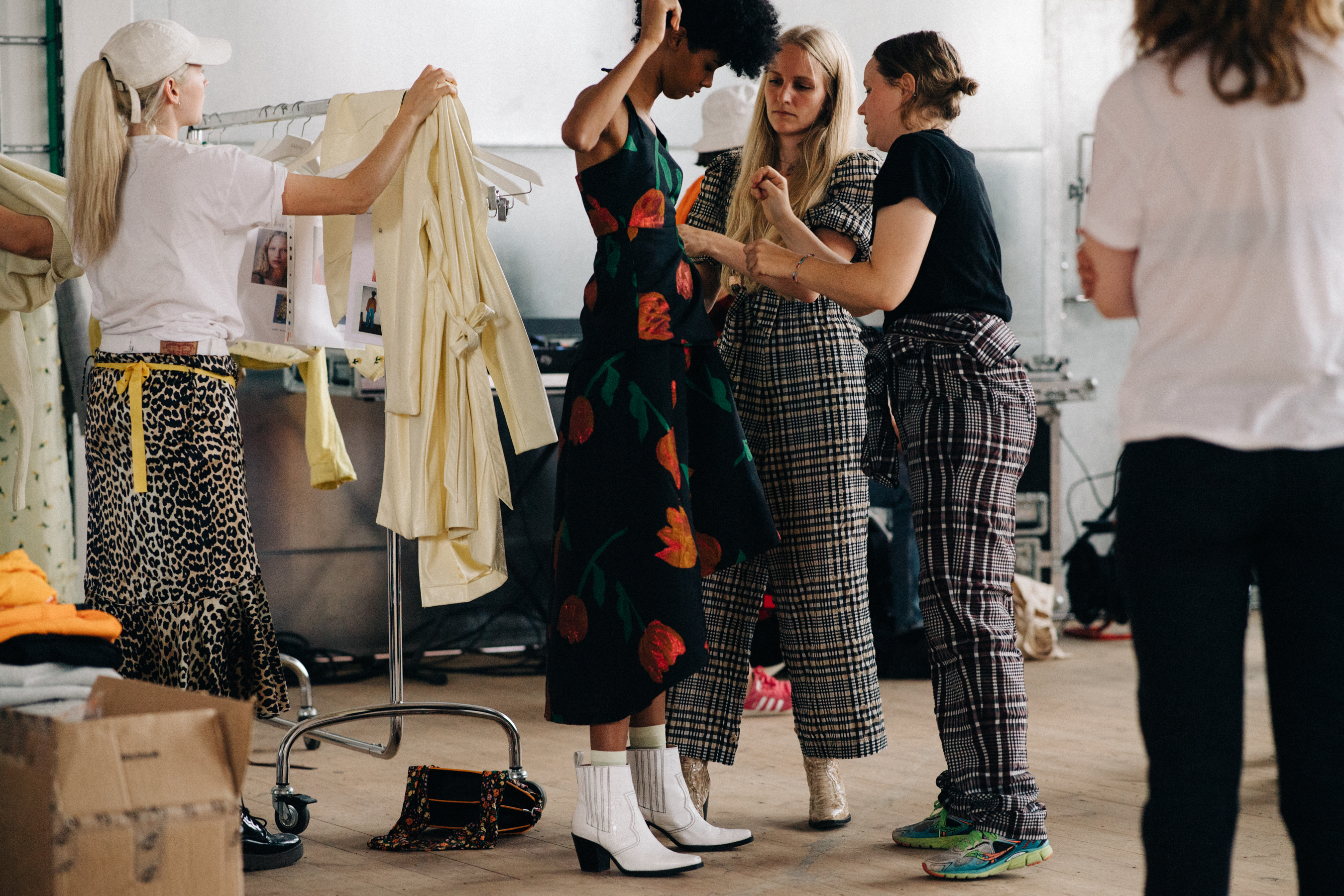 Model getting dressed before a show