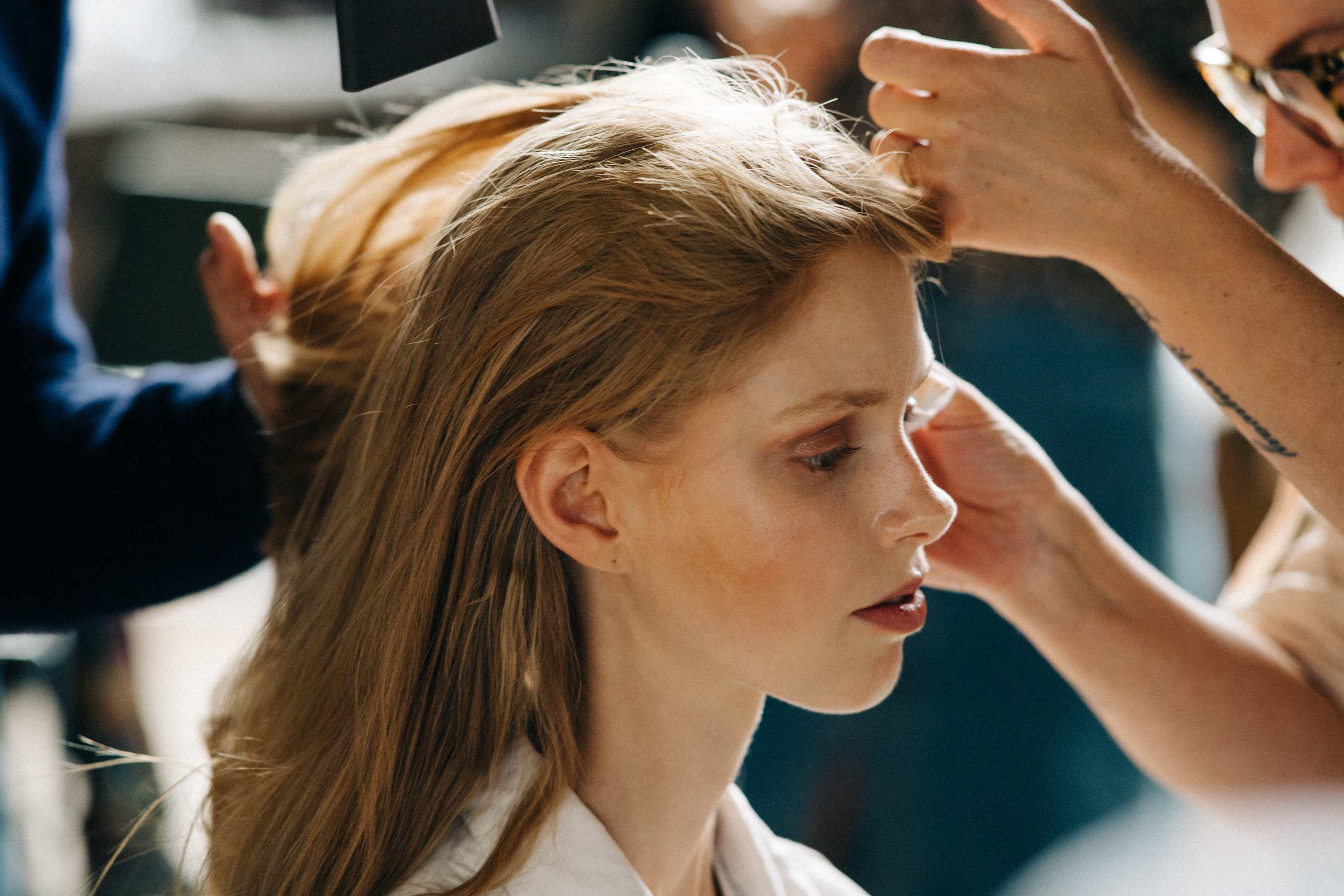 Model getting hair and make up done
